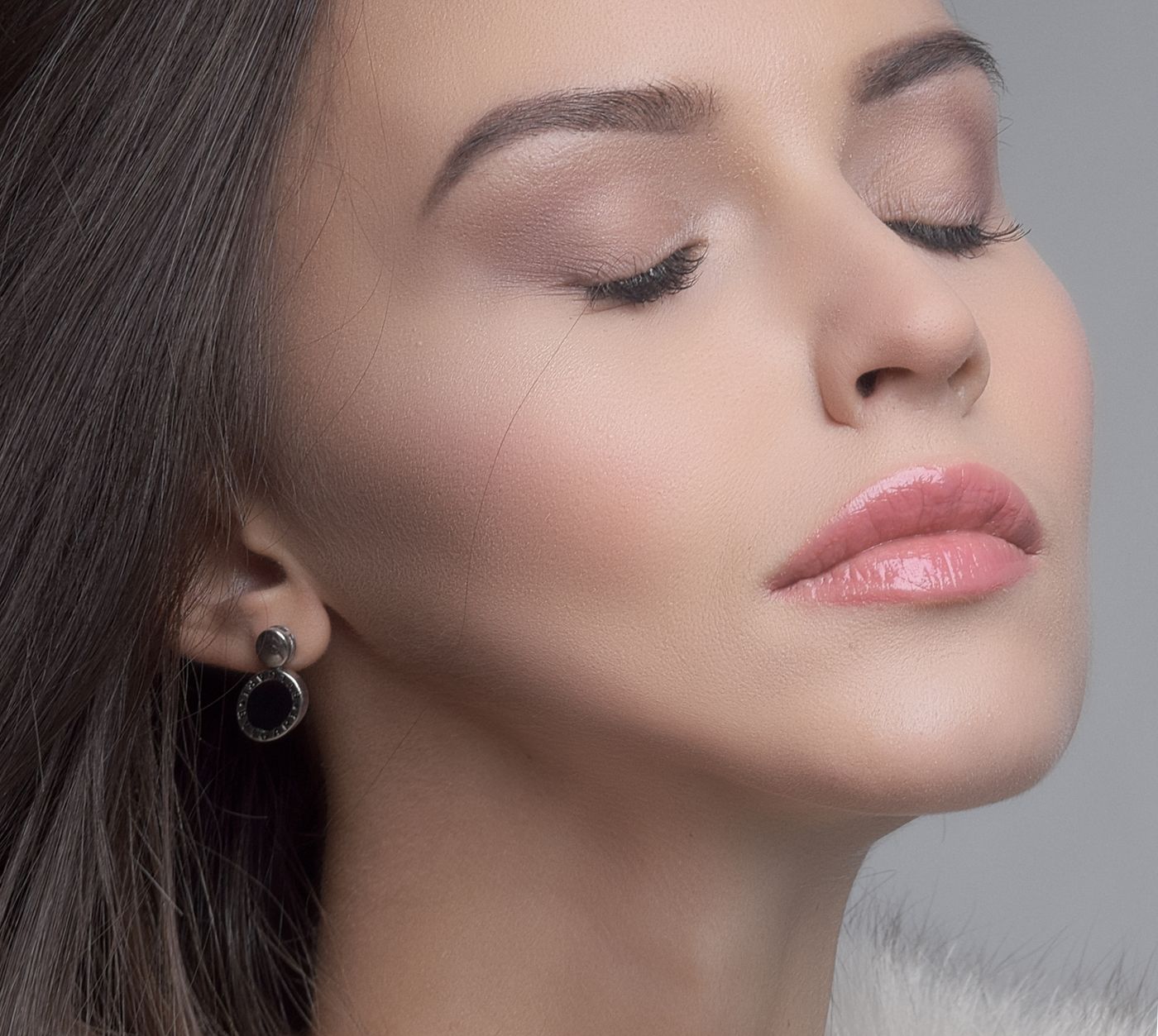 Editorial beauty portrait with eyes closed, illustrative of a calm consultation focus