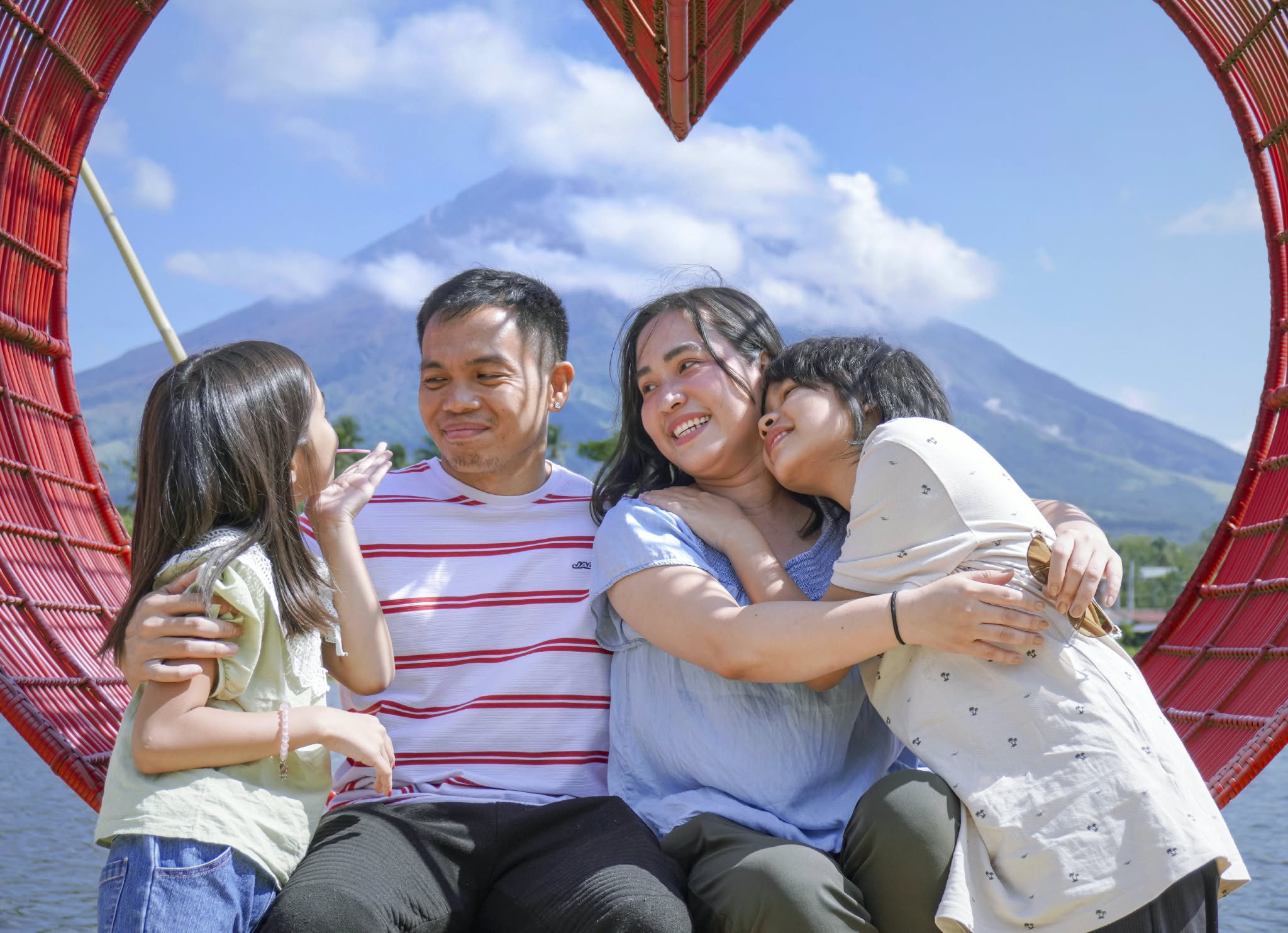 Happy family sharing a loving moment together outdoors
