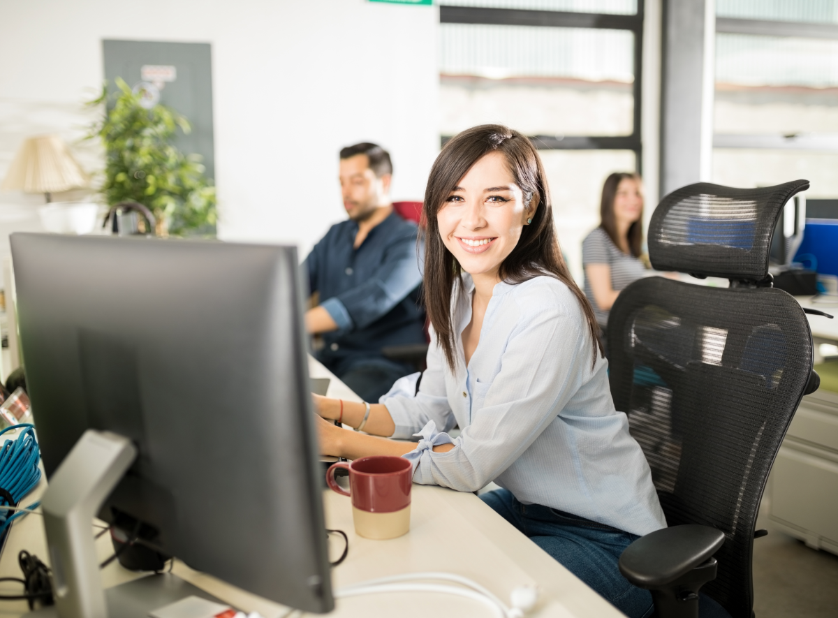 Virtual assistant at a workstation, from Virtual Assistant Talent's website