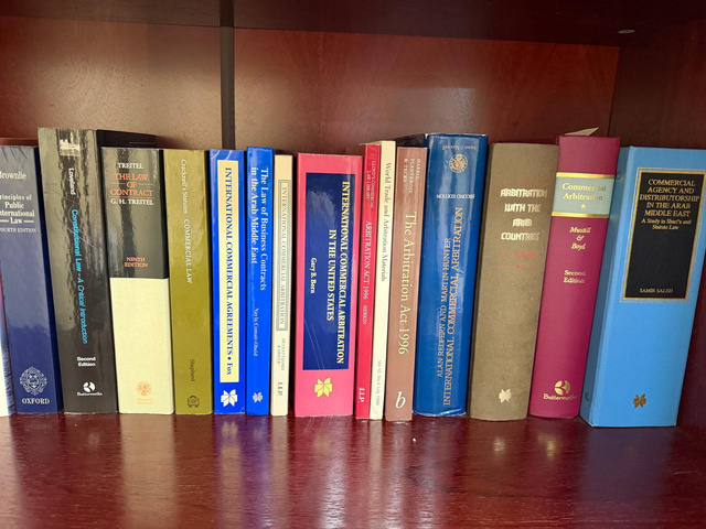 Law library reference books on commercial law, arbitration, and civil procedure