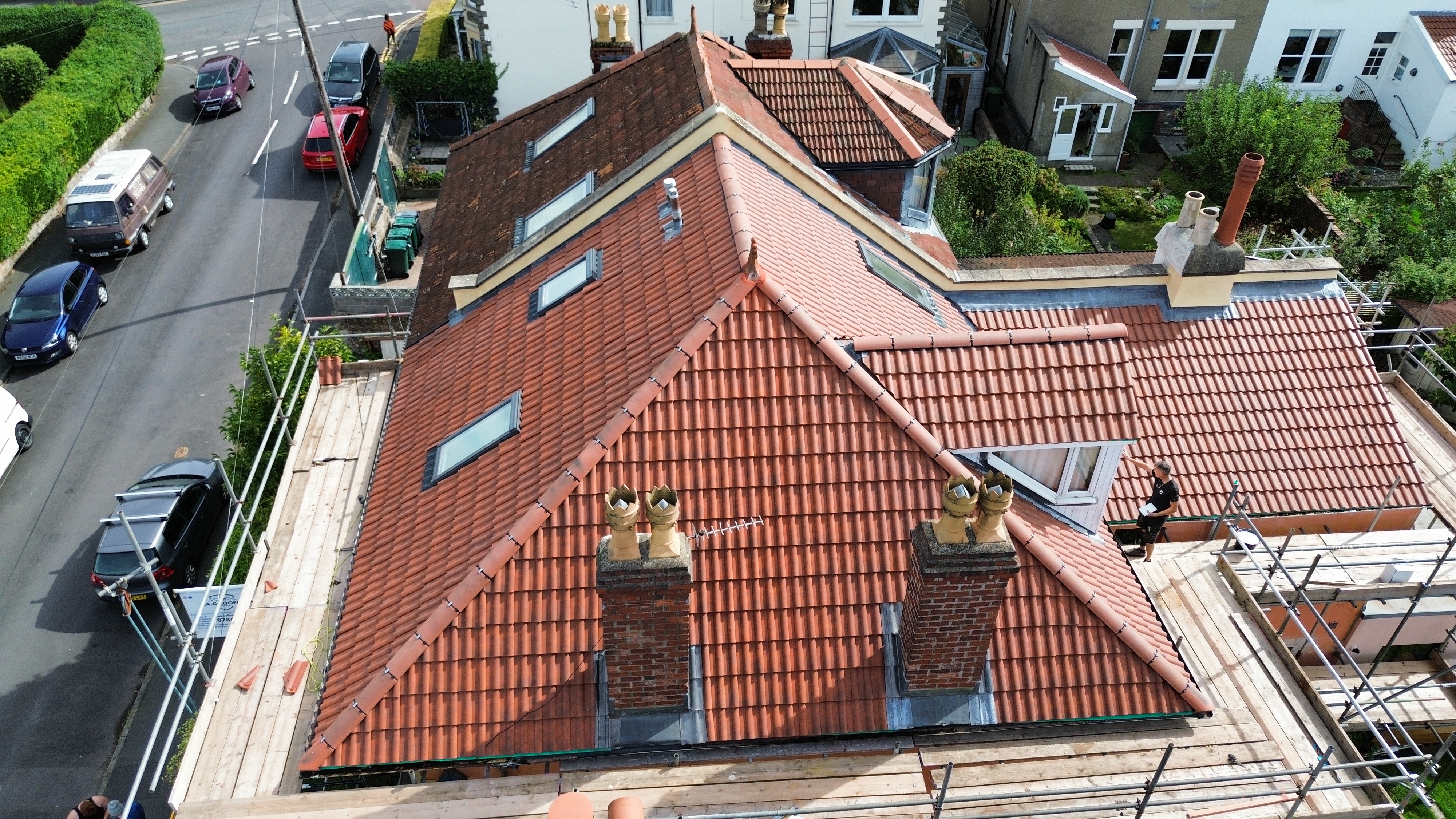 Aerial Drone Survey: Full overhead inspection of hipped roofline, dormers, chimneys and scaffolding in Bristol.