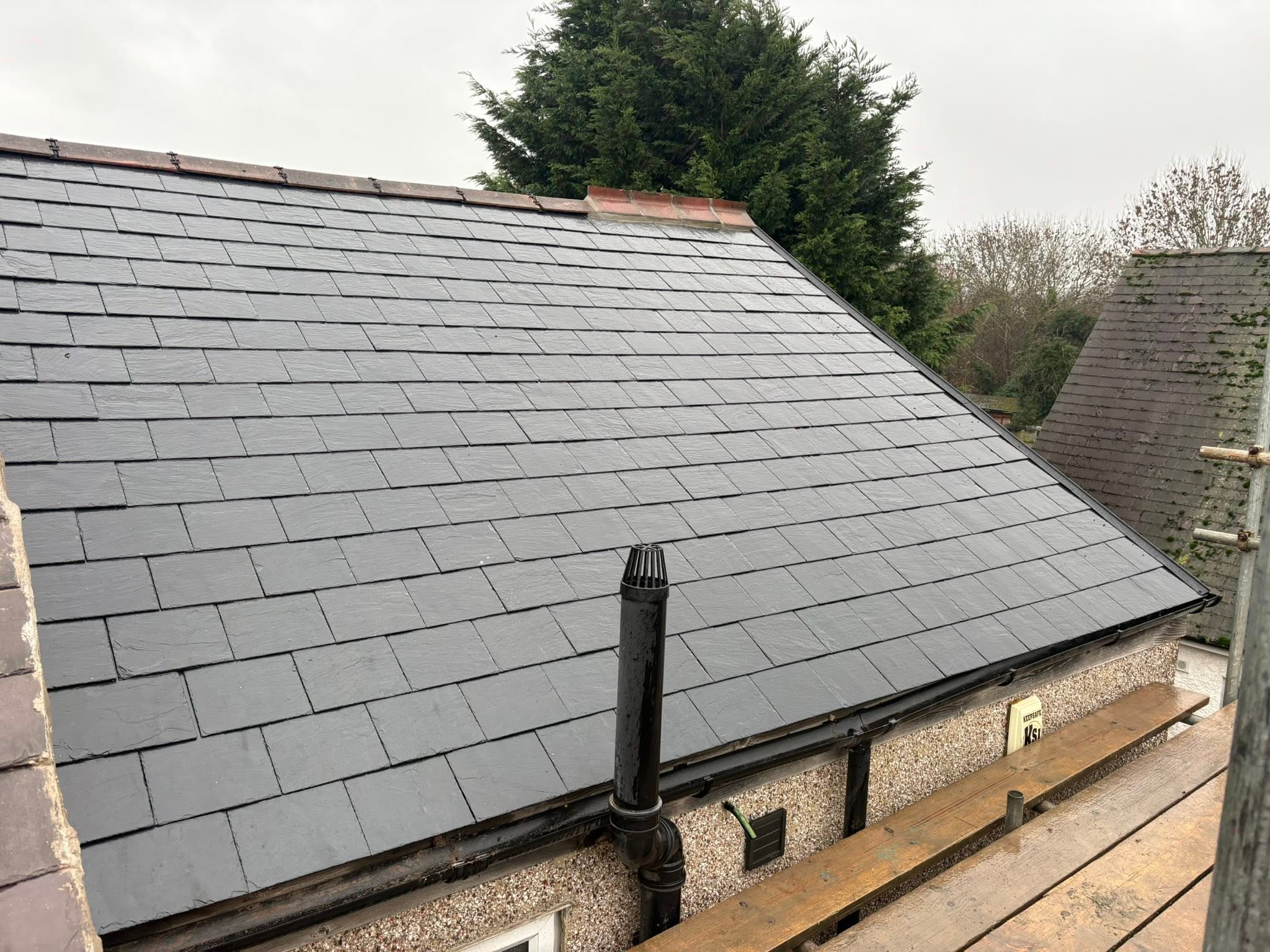Completed Spanish slate re-roof on a Bristol home by S.A.G Roofing Bristol