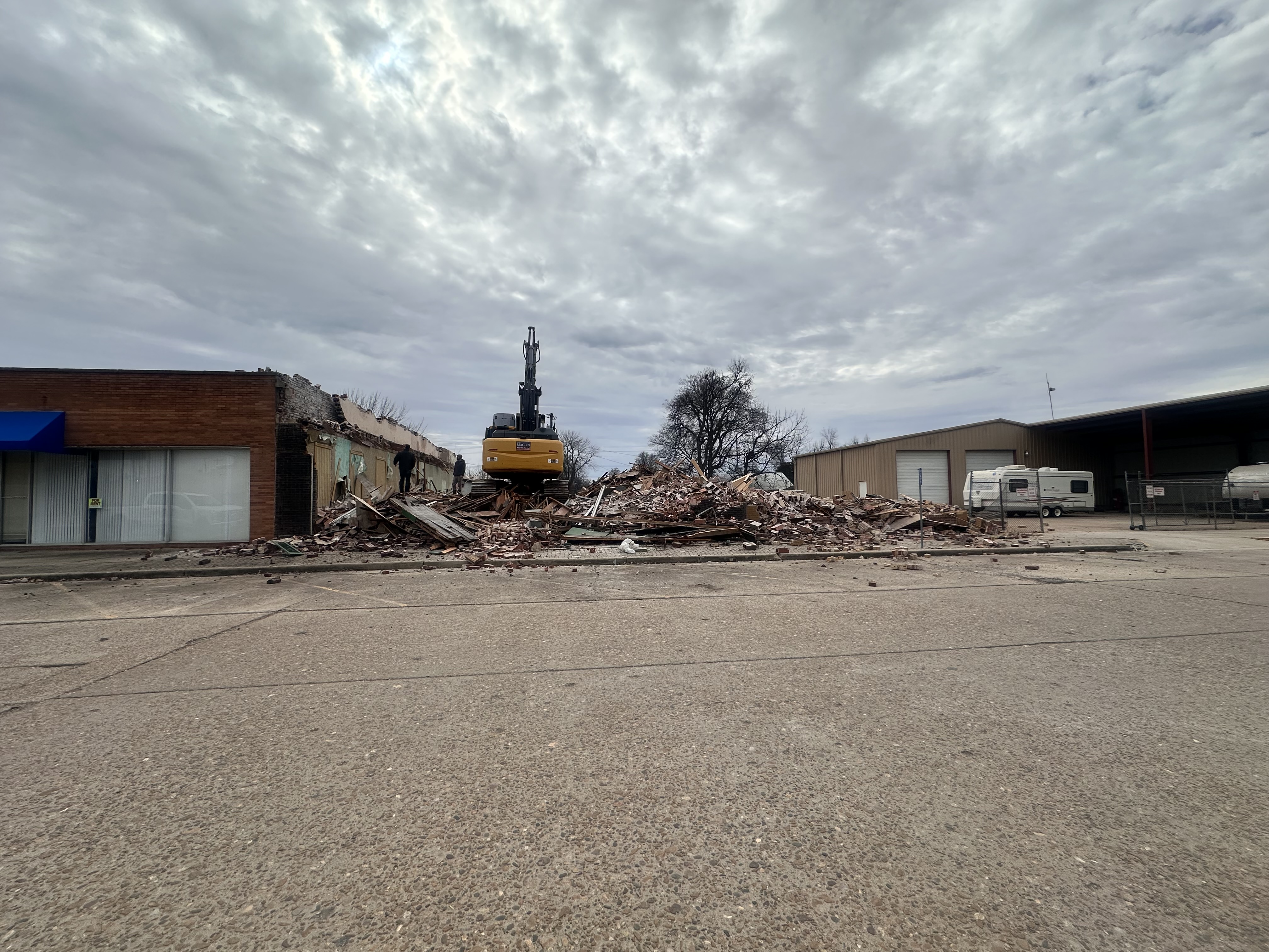 Excavator preparing a site for the next phase of construction