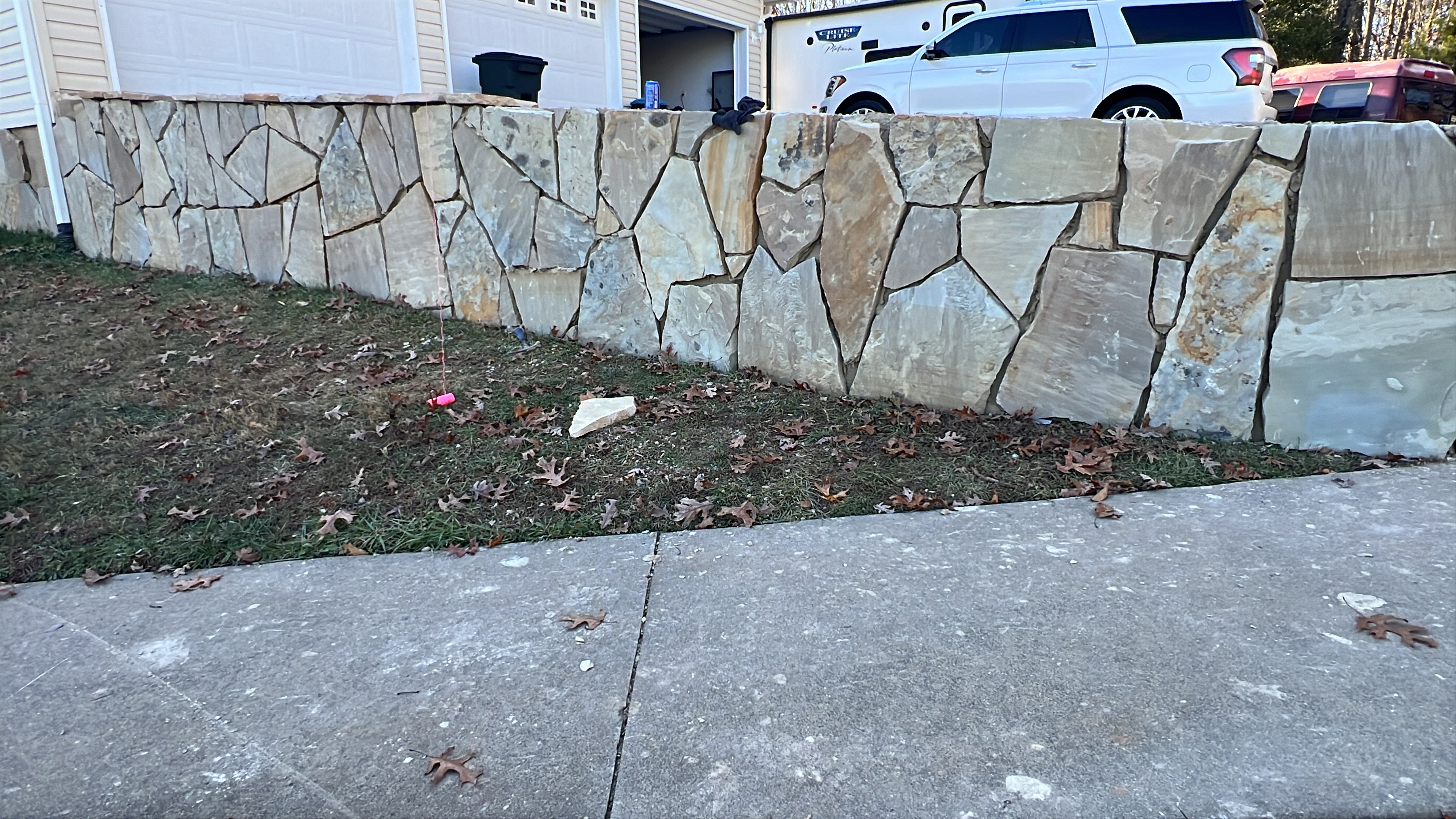 Natural Flagstone Retaining Wall & Driveway Masonry Border