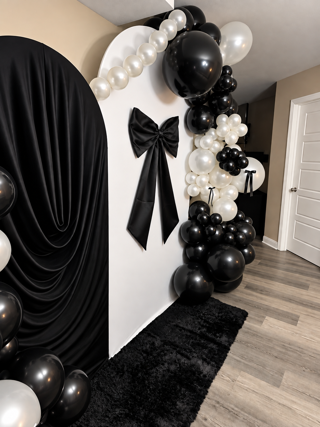Intimate Monochrome Baby Shower Draped Silk Arch and Statement Bow