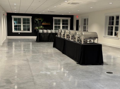 Side Room event space at The Willow set up with chafing dishes and buffet service line