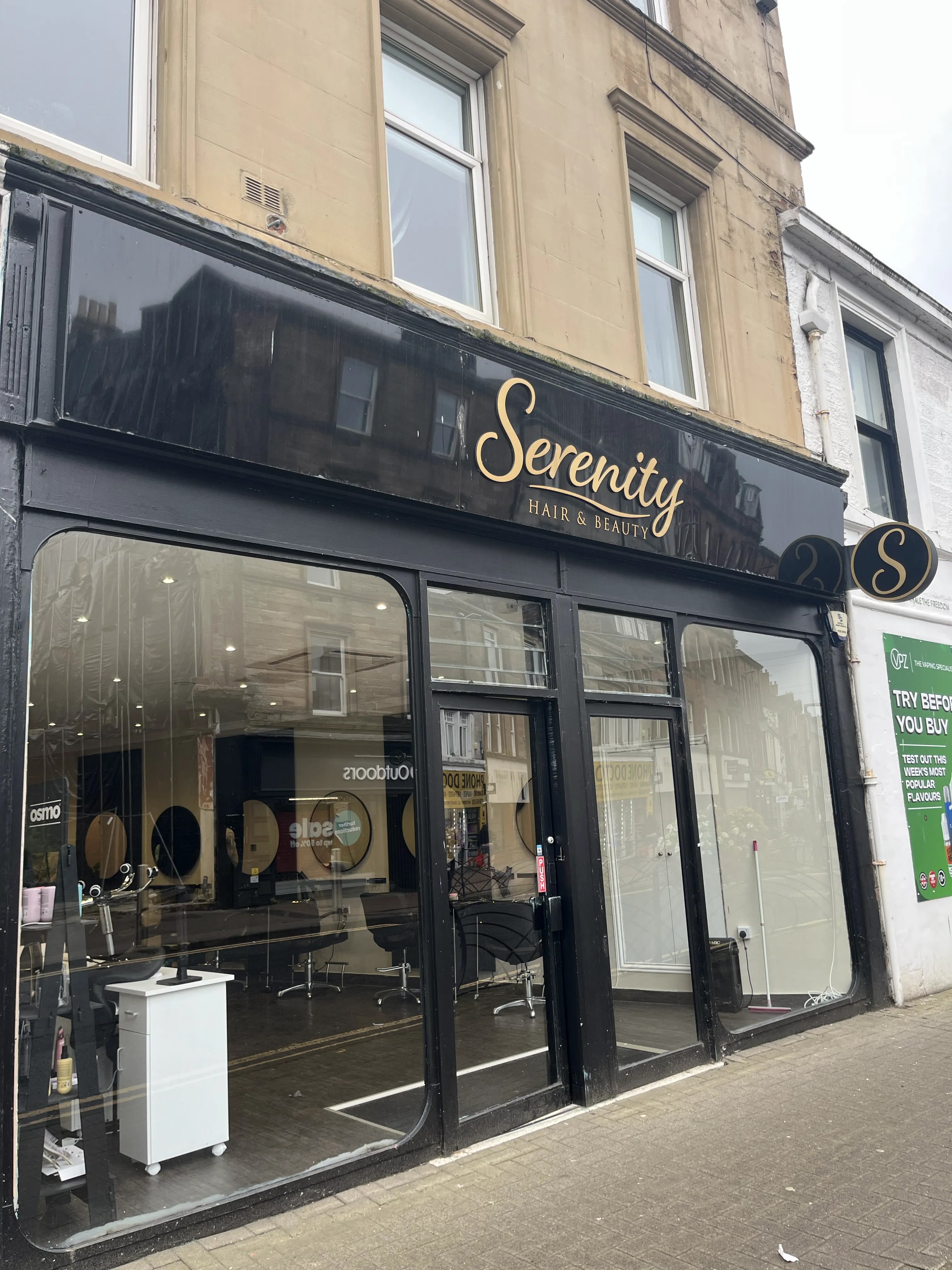 Serenity Hair & Beauty storefront at 2 Kyle Street, Ayr showing the signature black and gold fascia