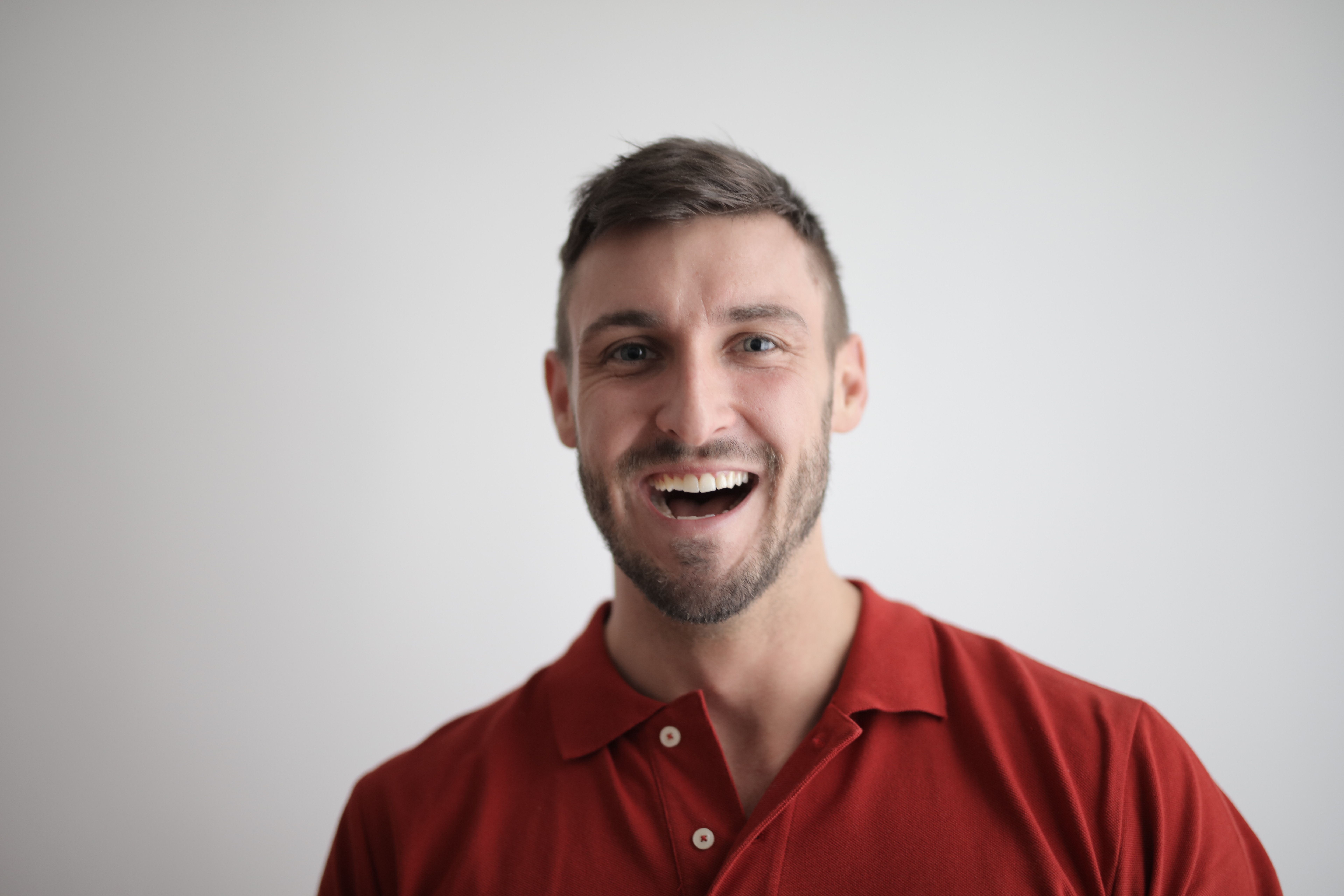 Man laughing with genuine relief and joy