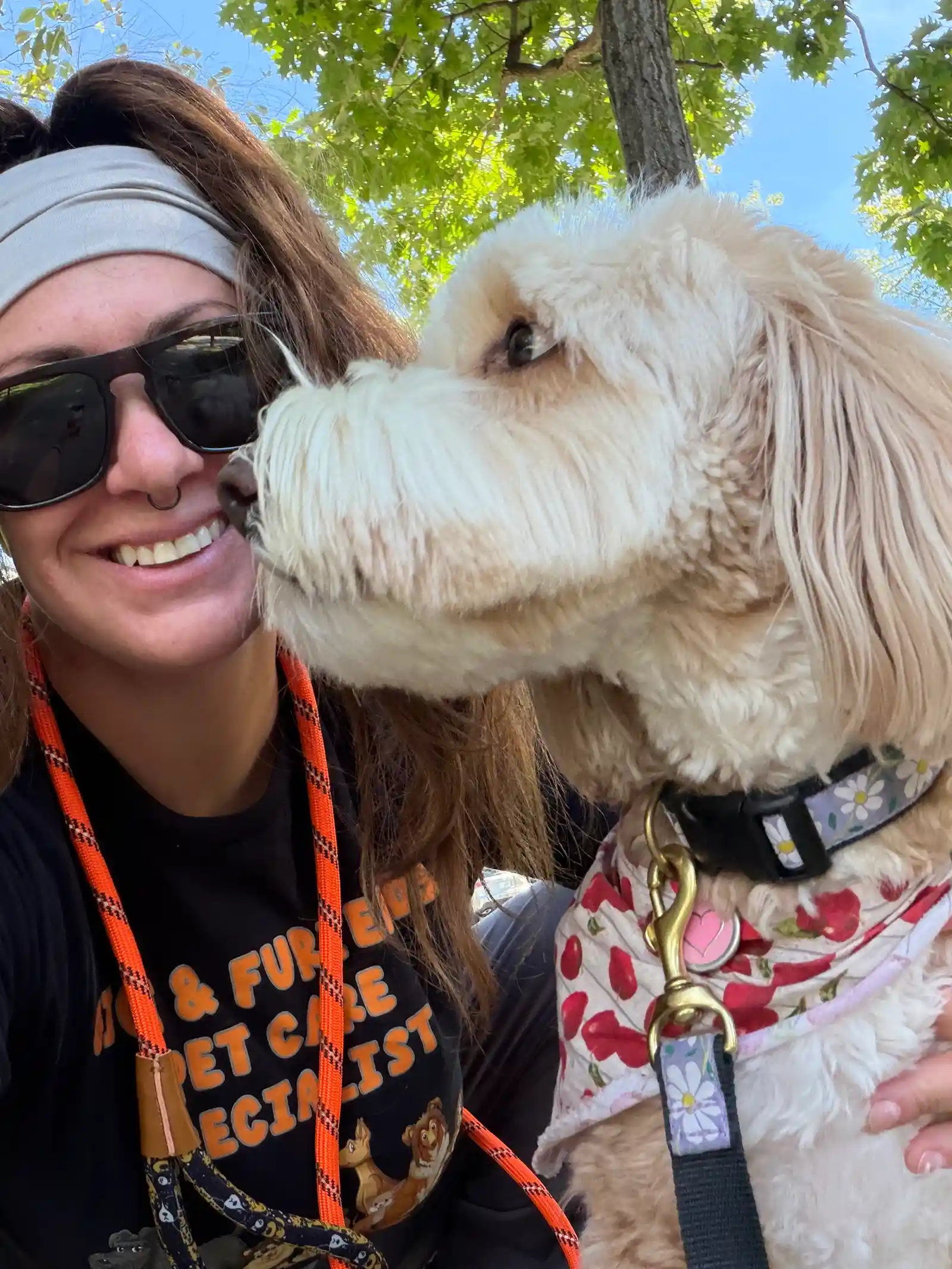 Selfie in sunglasses with golden doodle wearing floral bandana — Super Gigi pet sitting and dog walking in Bergen County, NJ