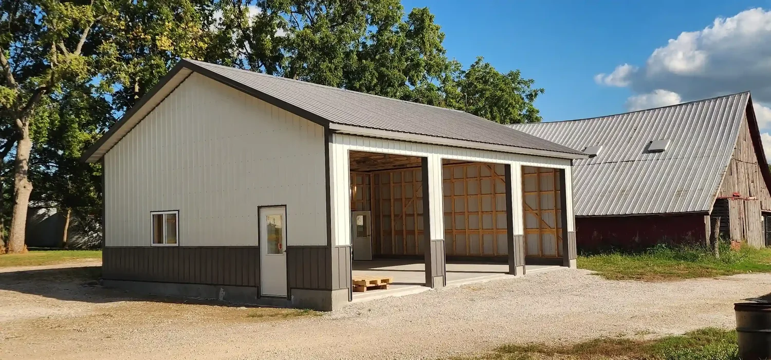 3-car modern black steel garage built by Build N Trust