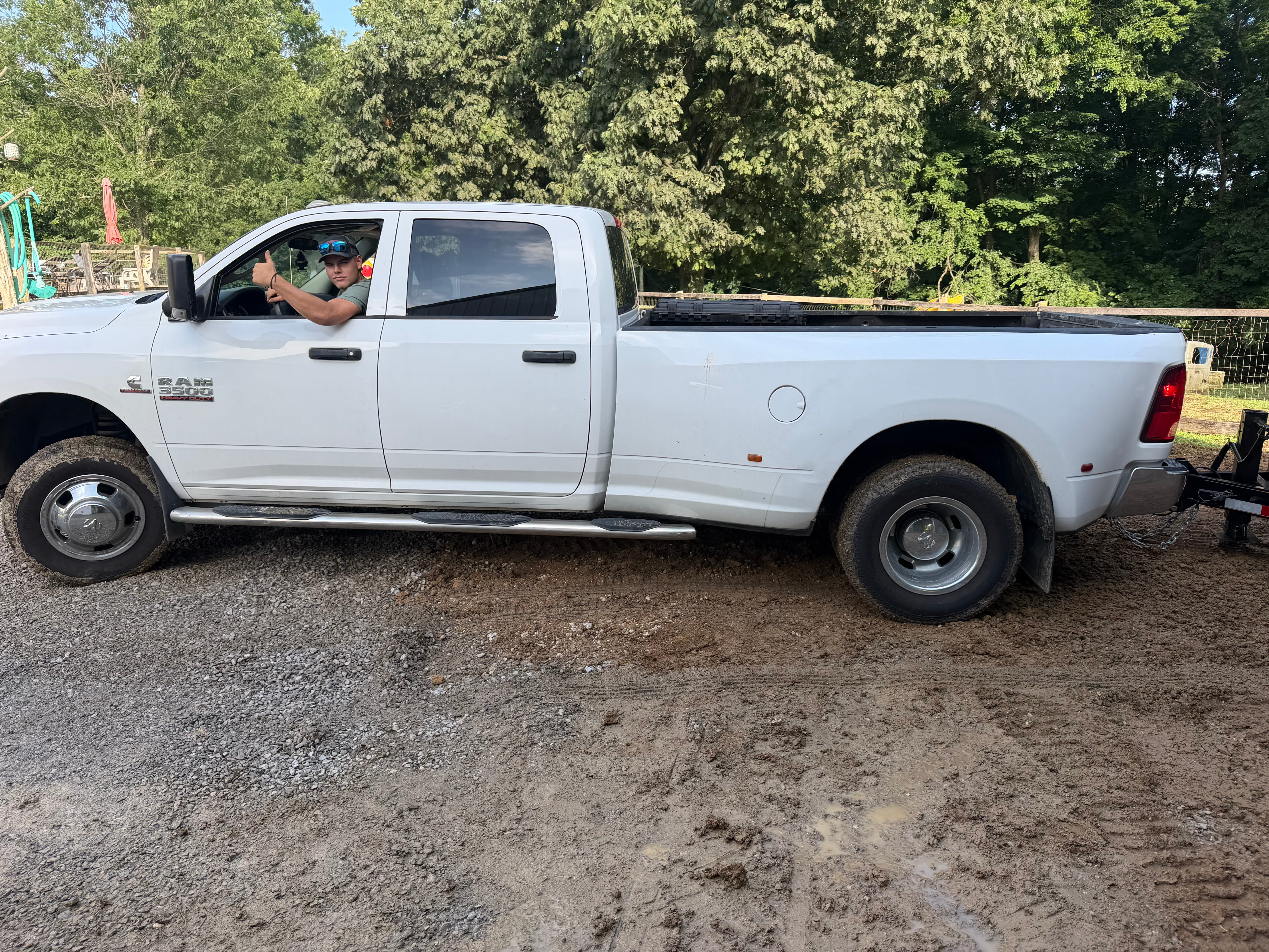 RR Property Solutions owner on site in the truck giving a thumbs up