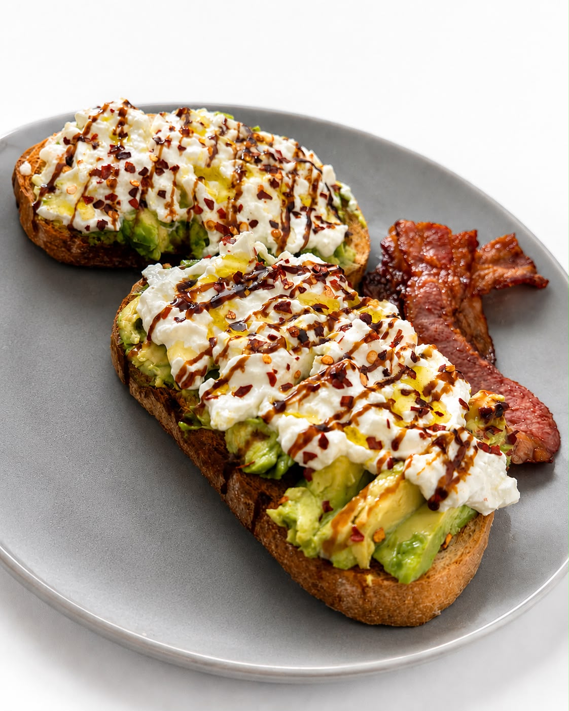 Avocado toast with burrata and bacon