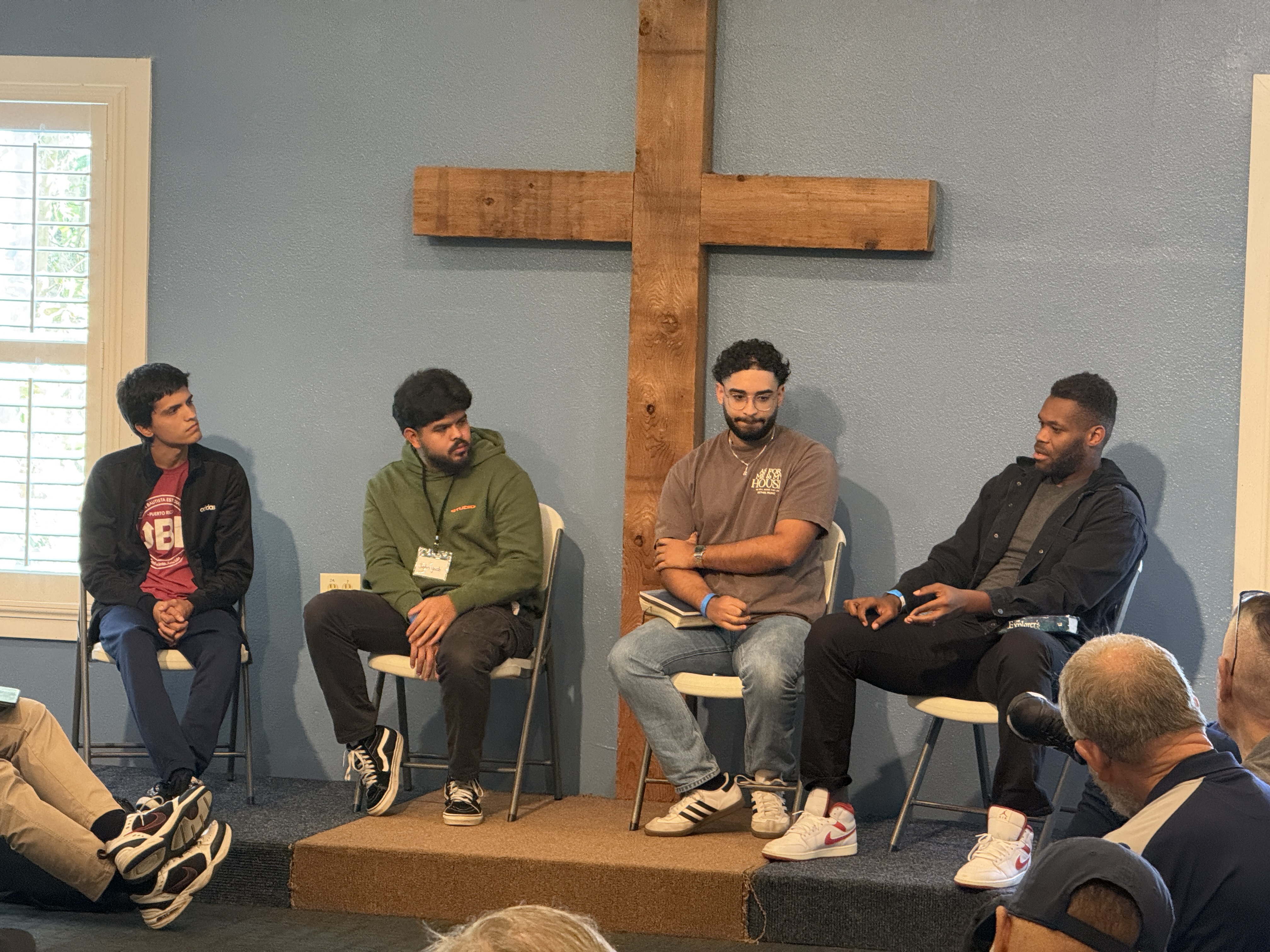 Discussion beneath the cross at the Consecration Prayer Summit
