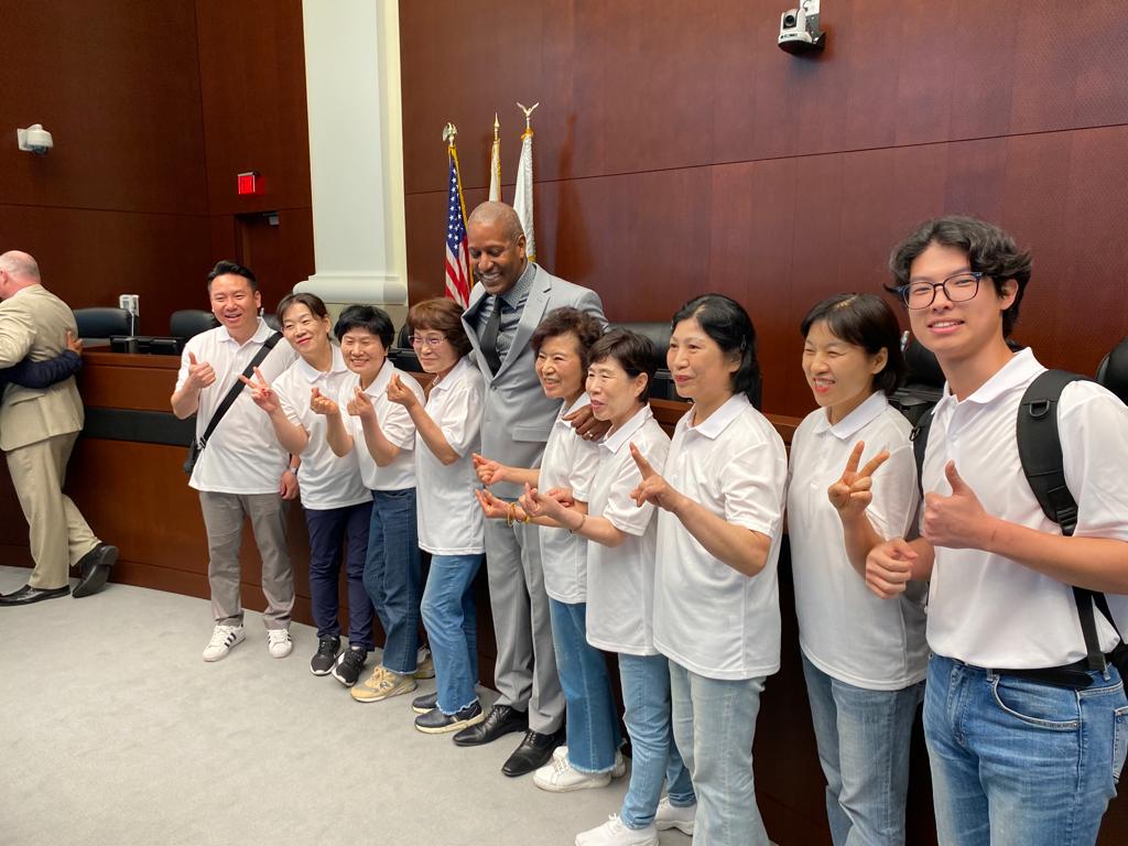Homestead prayer community group in white polos