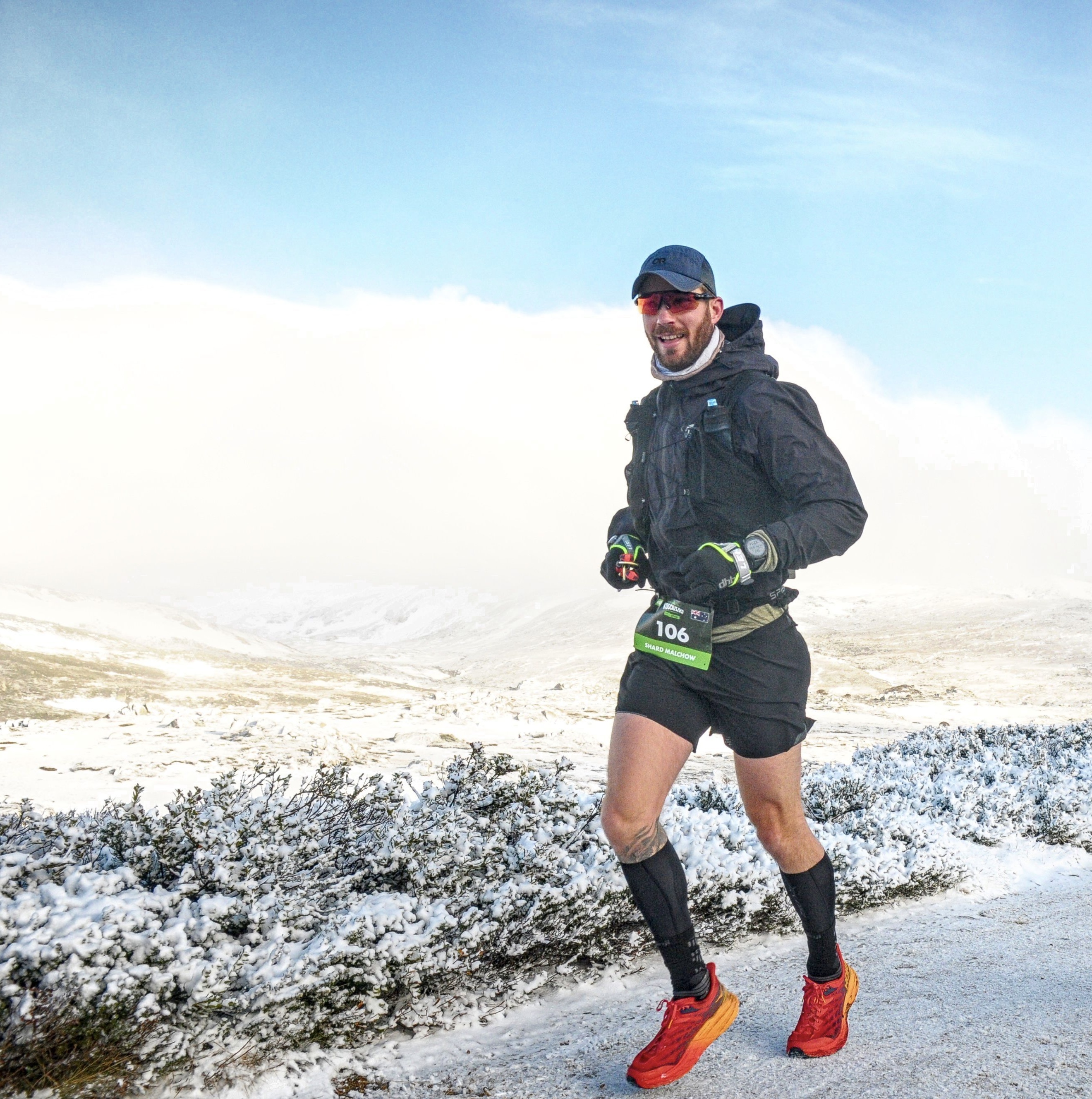 Shard Malchow running through alpine snow terrain
