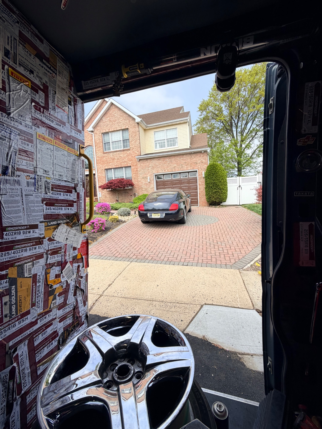 Bentley Continental getting mobile tire service during a driveway visit - On Site Mobile Tire Service