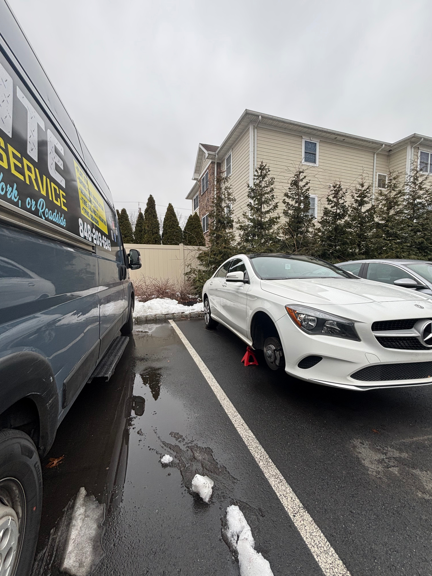 Mercedes-Benz CLA getting mobile tire service in a parking lot - On Site Mobile Tire Service