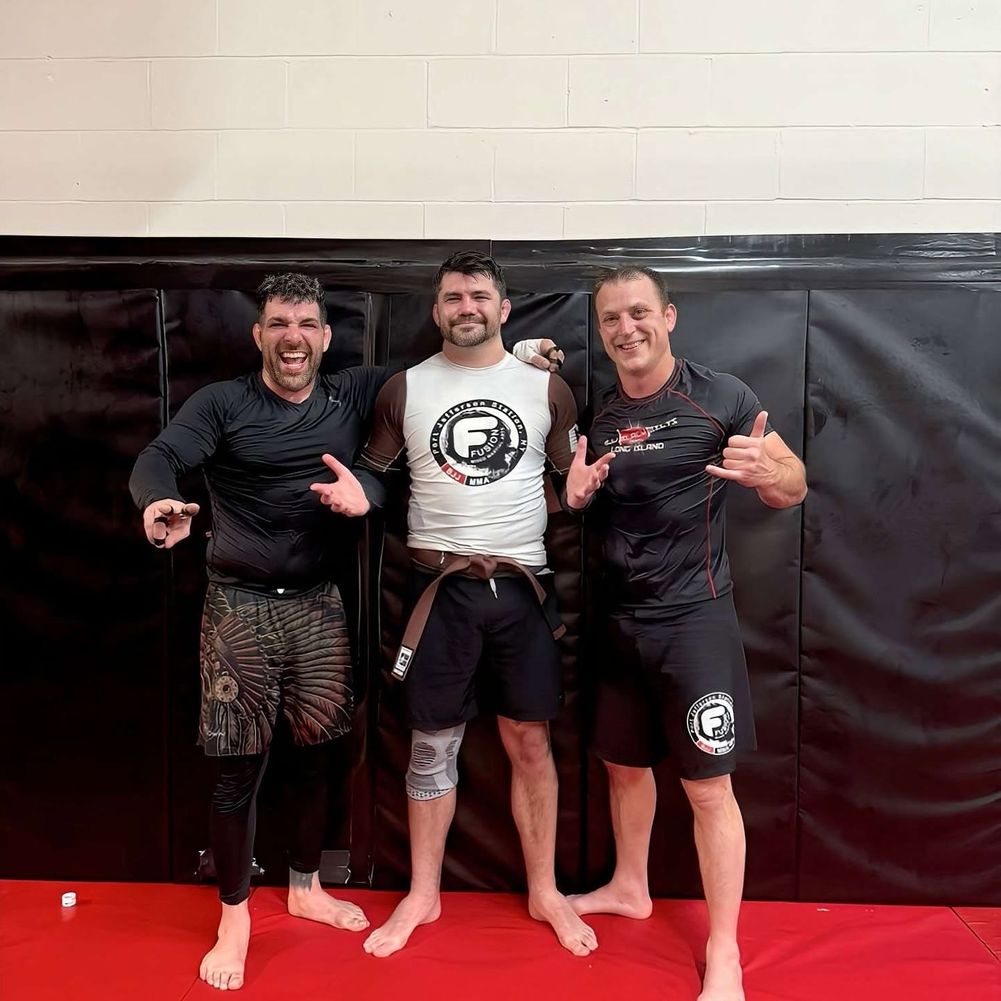 Fusion BJJ teammates on the mats after rolling session