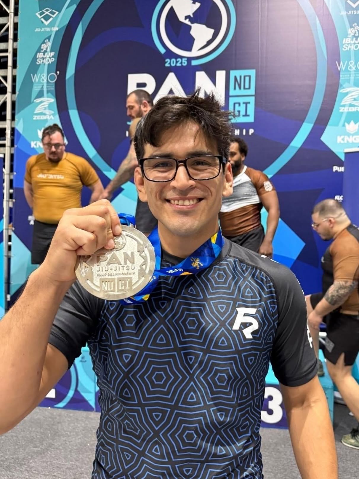 Fusion competitor with Pan No-Gi Jiu-Jitsu Championship medal