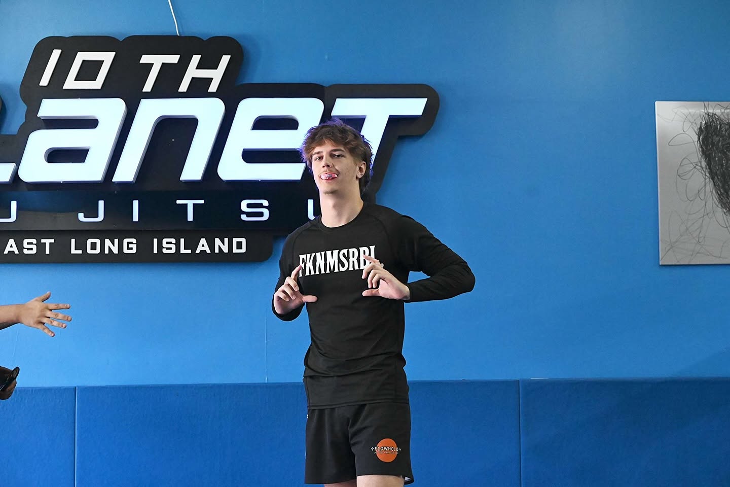 Fusion Jiu-Jitsu competitor on the mat in competition gear