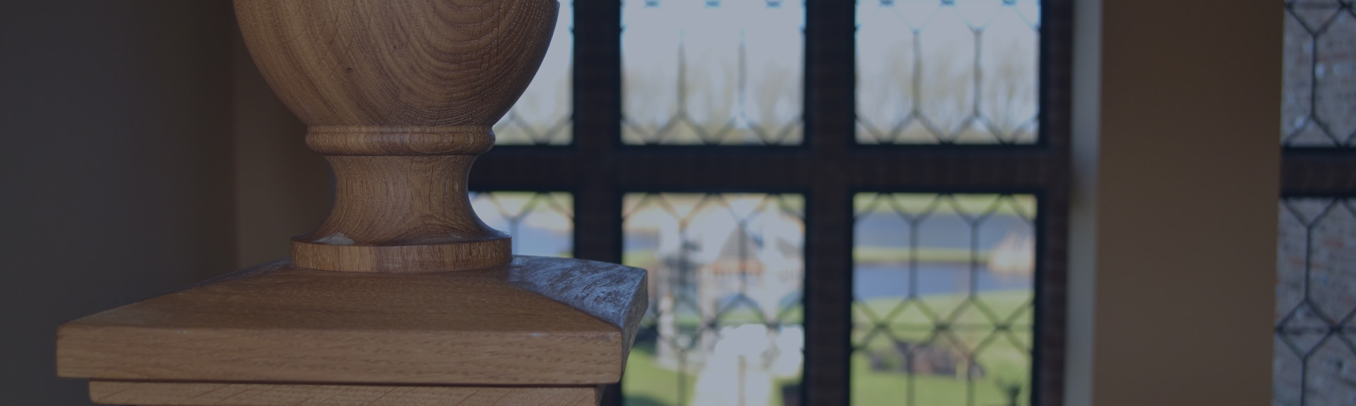 Bespoke architectural turned timber finial and leaded windows by Salmons Brothers