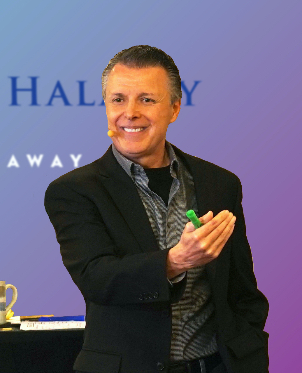 Dale Halaway smiling and speaking