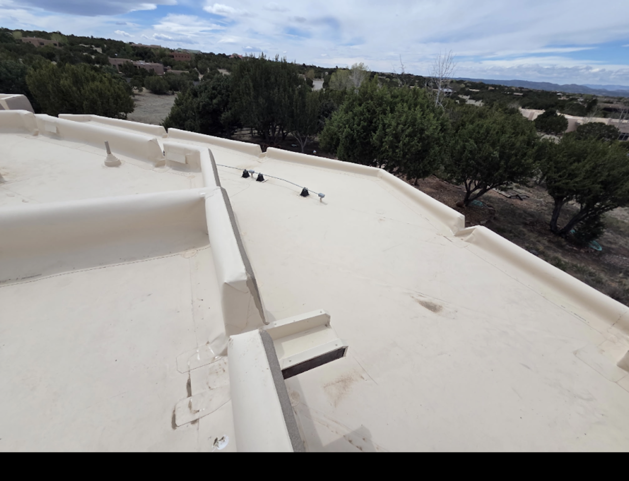 Parapet Wall & Scupper Drainage System completed by Confidence Roofing LLC