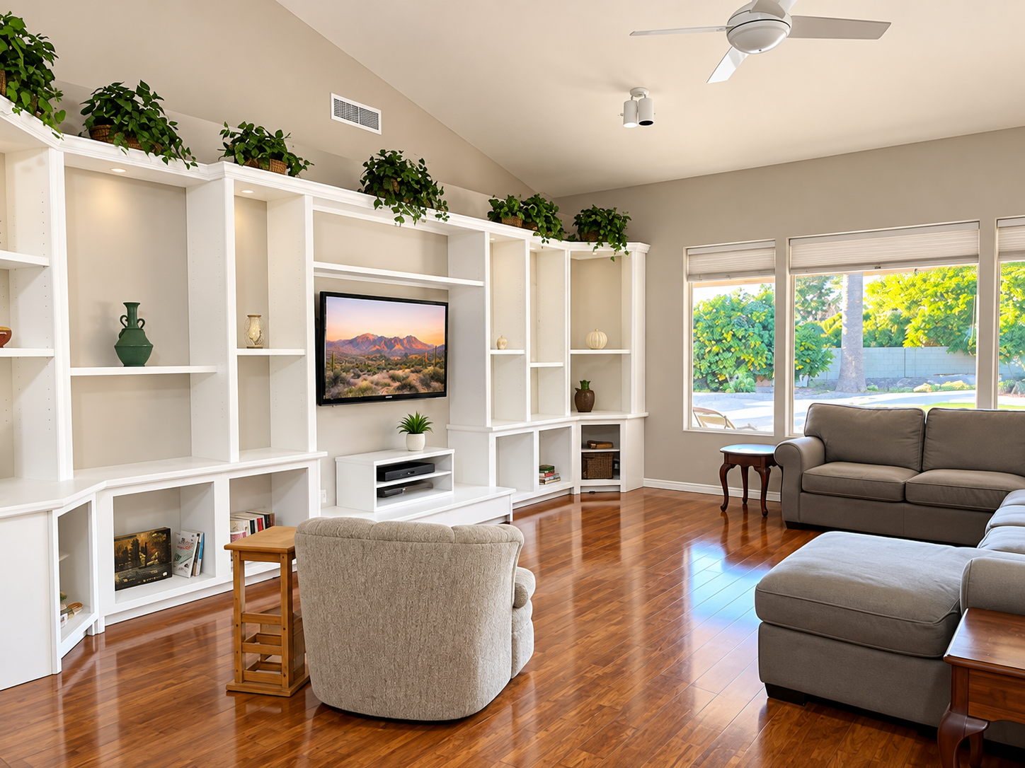 Spacious, tranquil living room with natural light and custom shelving at Serenity Circle RTC in Mesa, AZ