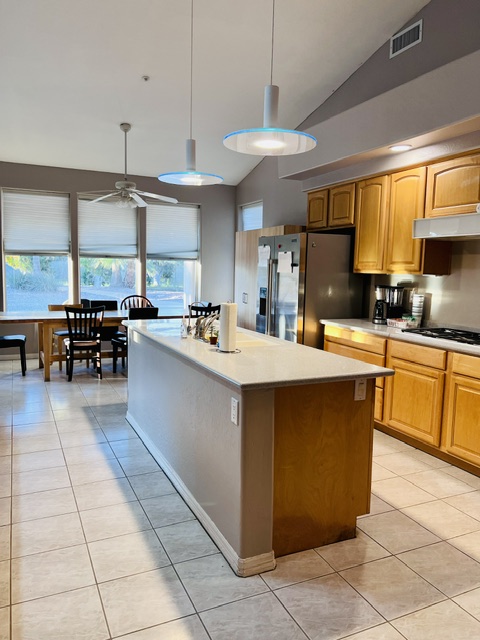 Spacious resident kitchen and dining bar at Serenity Circle RTC in Mesa, AZ