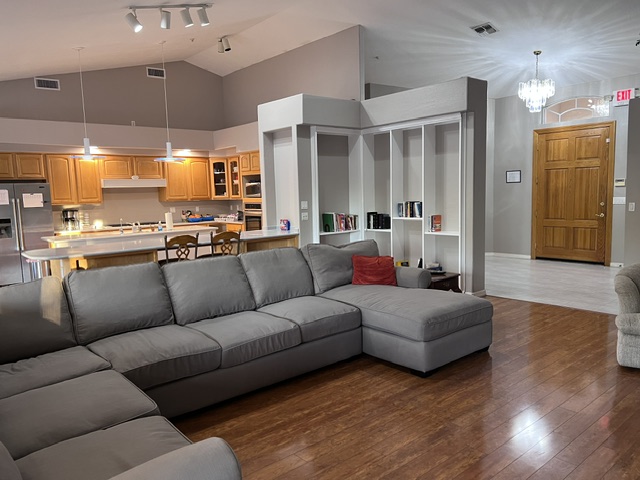Spacious open living room and full kitchen at Serenity Circle RTC in Mesa, AZ