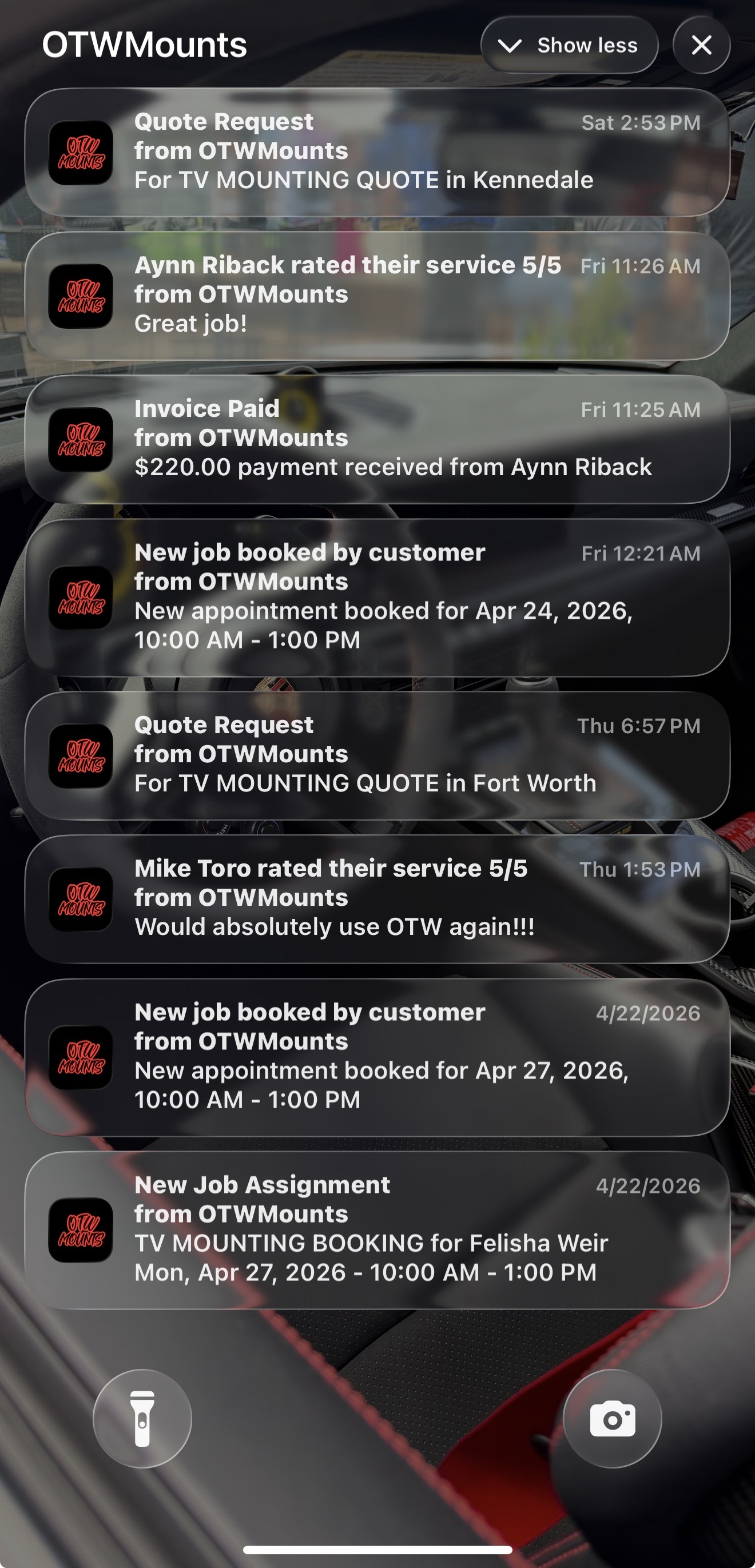 Real phone lock screen showing incoming TV mounting booking alerts and 5/5 reviews