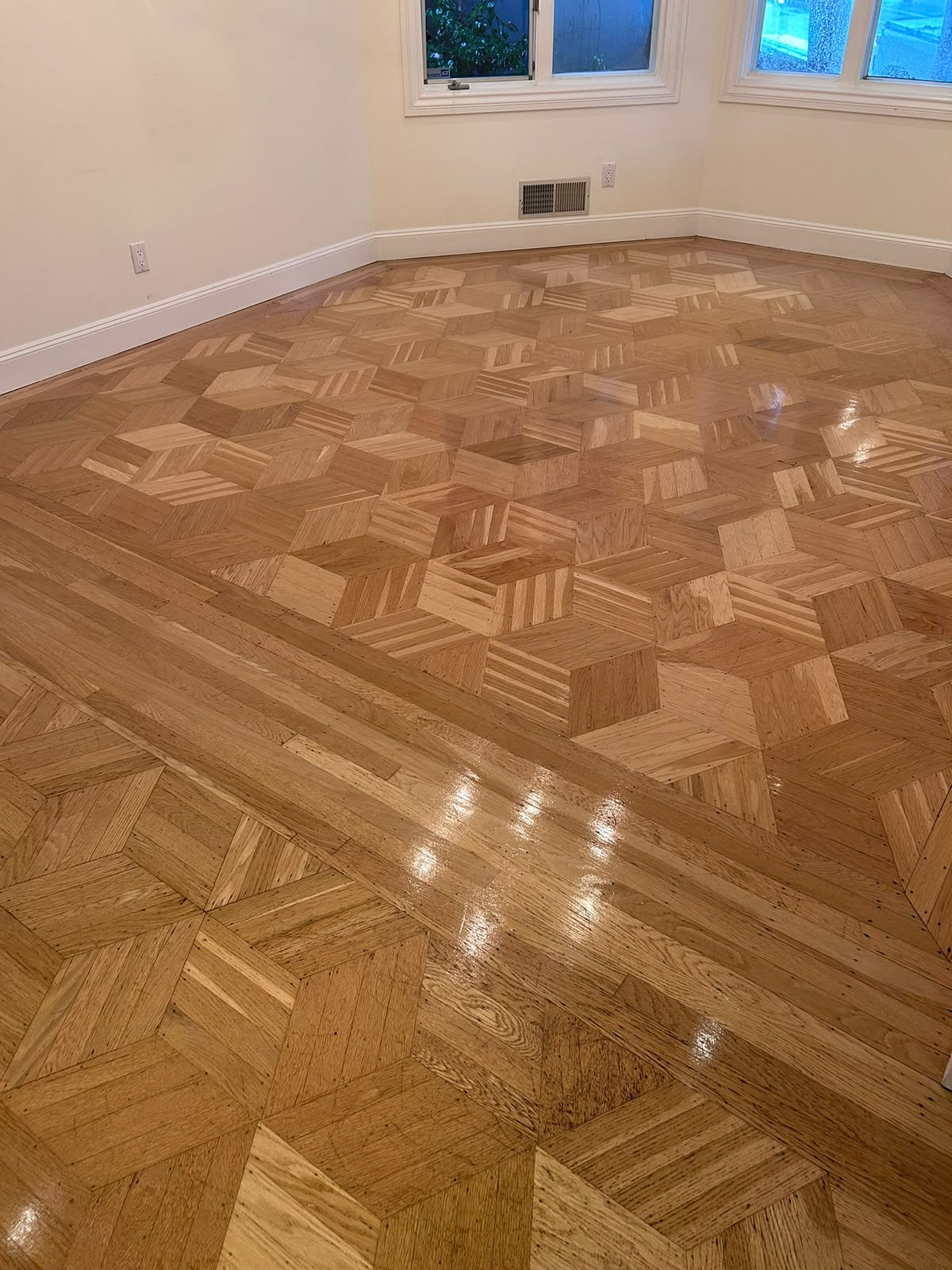 Geometric parquet hardwood floor restoration and polish by All Five Star MJ, Inc.
