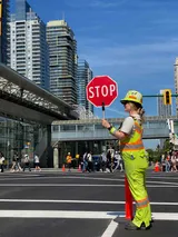 Petersons BCCSA-certified Traffic Control Person with STOP paddle