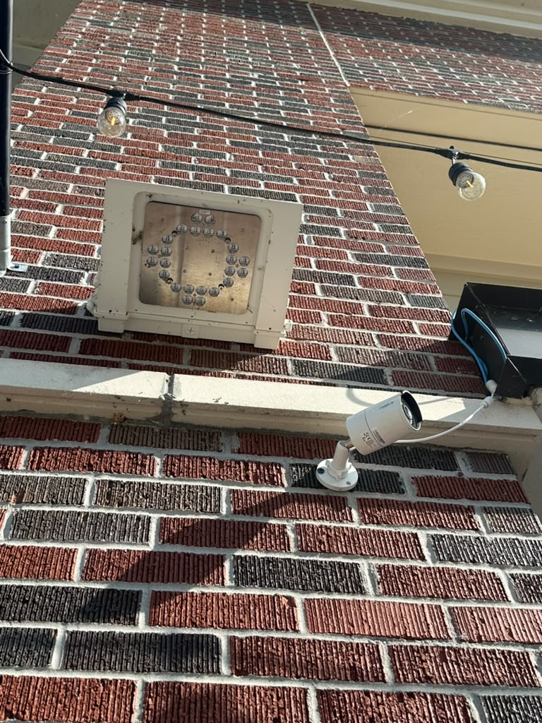 Commercial brick exterior security lighting and camera wiring by Anaeli GM Electric LLC