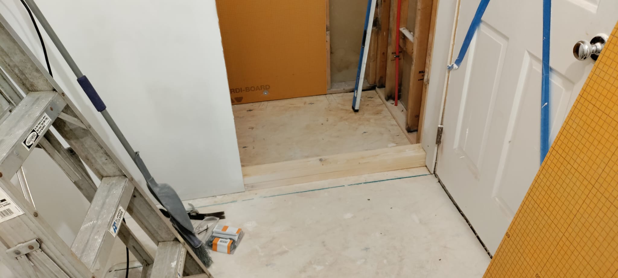 Shower curb framing and level subfloor preparation for waterproof pan installation by Rvicente Remodeling LLC in Seneca SC