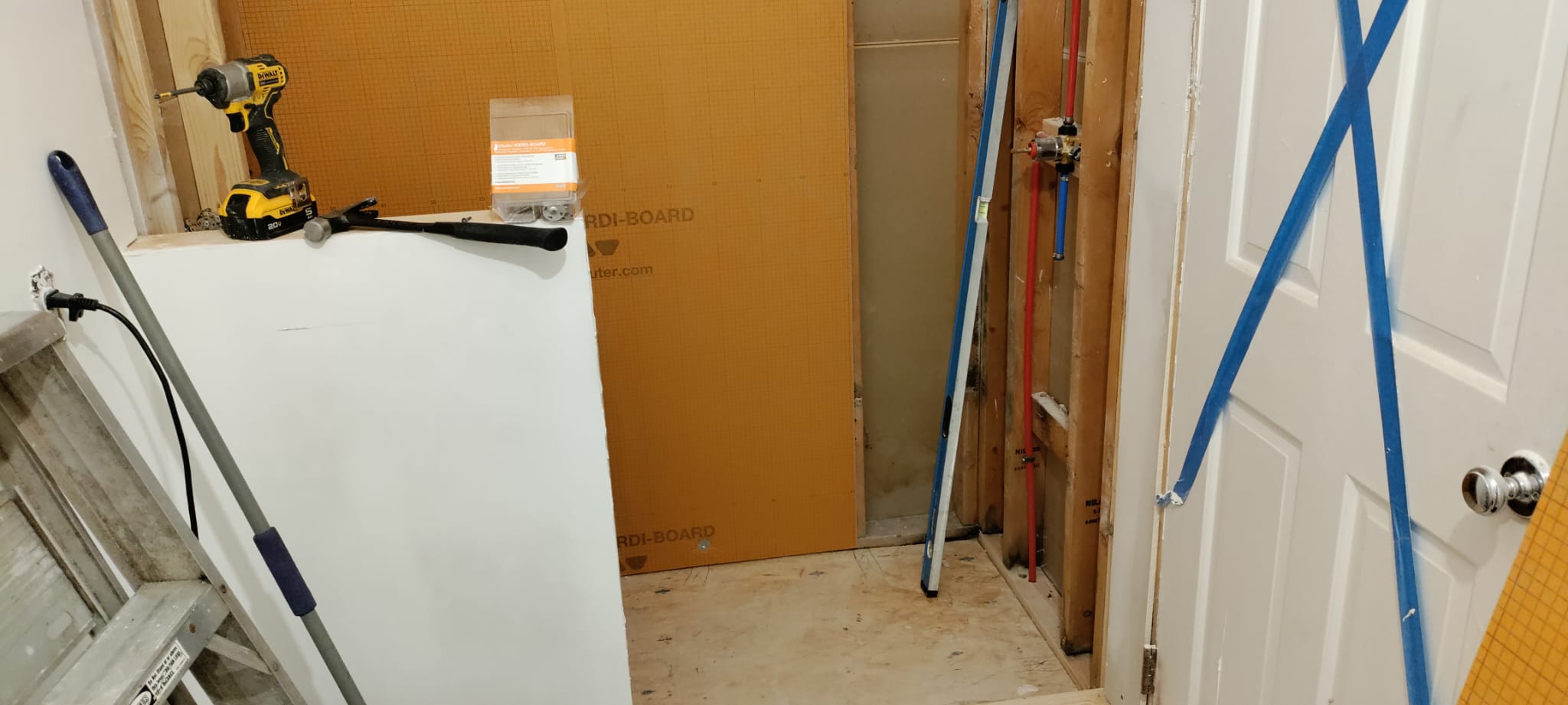 Schluter Kerdi-Board waterproof shower substrate and rough-in plumbing installation by Roberto Vicente in Easley SC