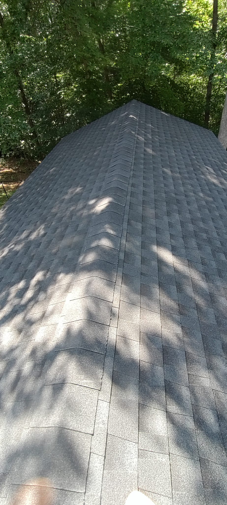 Newly installed architectural asphalt shingle roof with precision capped ridge line by Rvicente Remodeling LLC in Easley SC