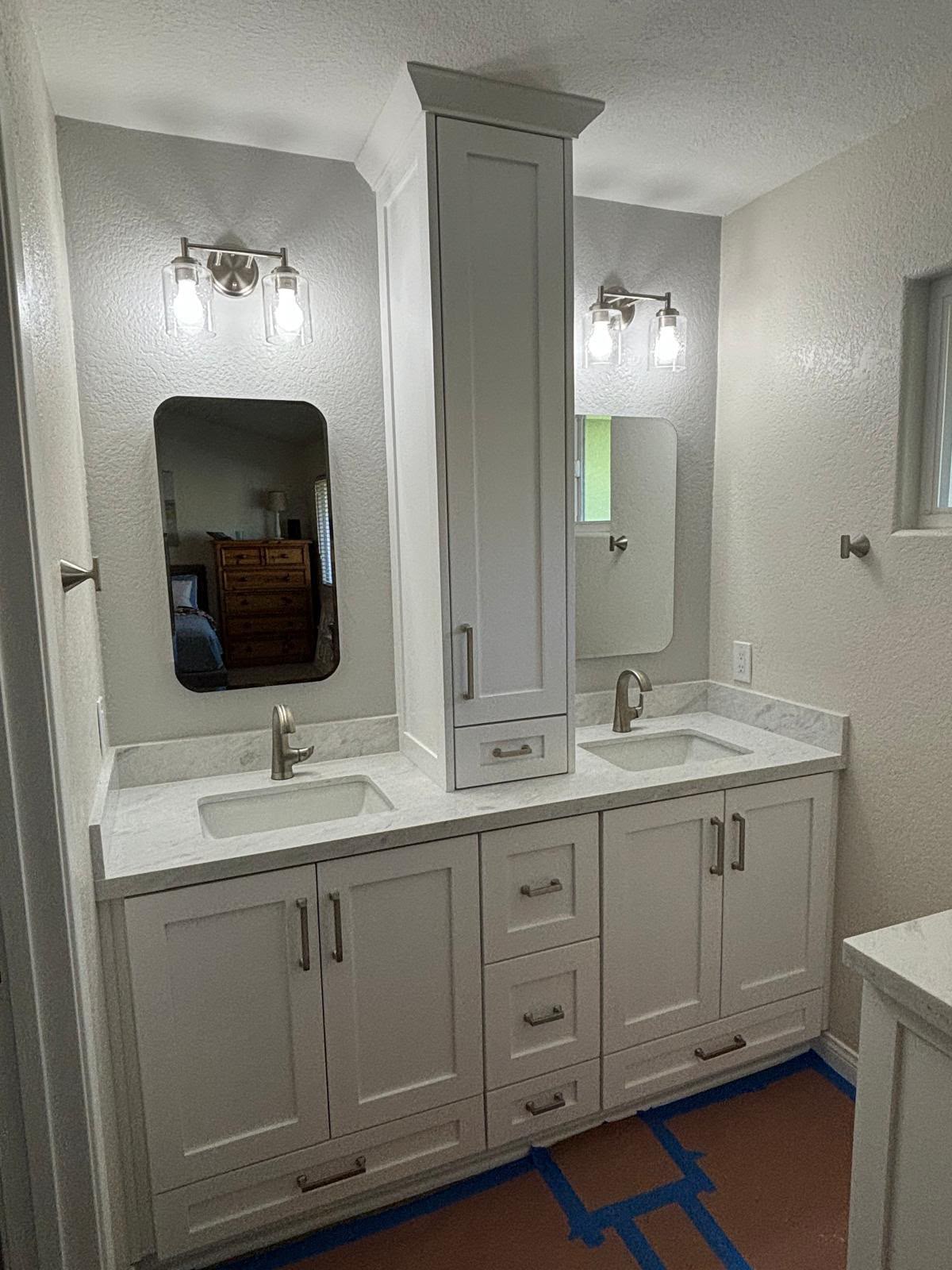Custom double bathroom vanity and vertical linen tower cabinet by Custom Cabinets San Diego in Bonita CA