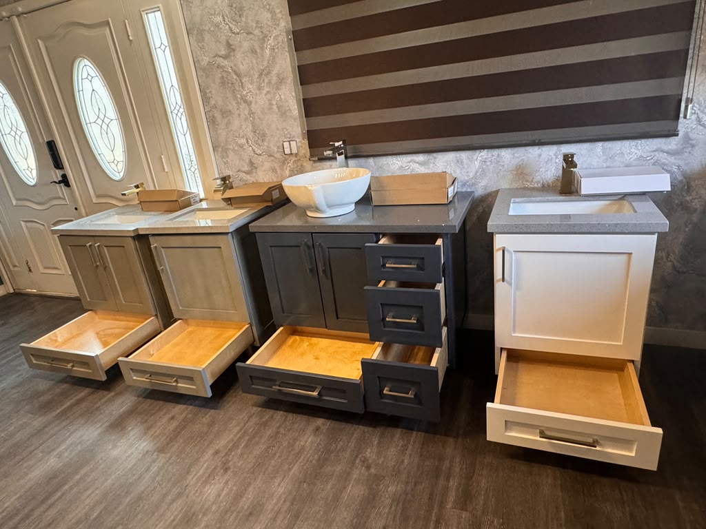 Custom bathroom vanity lineup with dovetail bottom pull-out drawers and quartz tops by Custom Cabinets San Diego