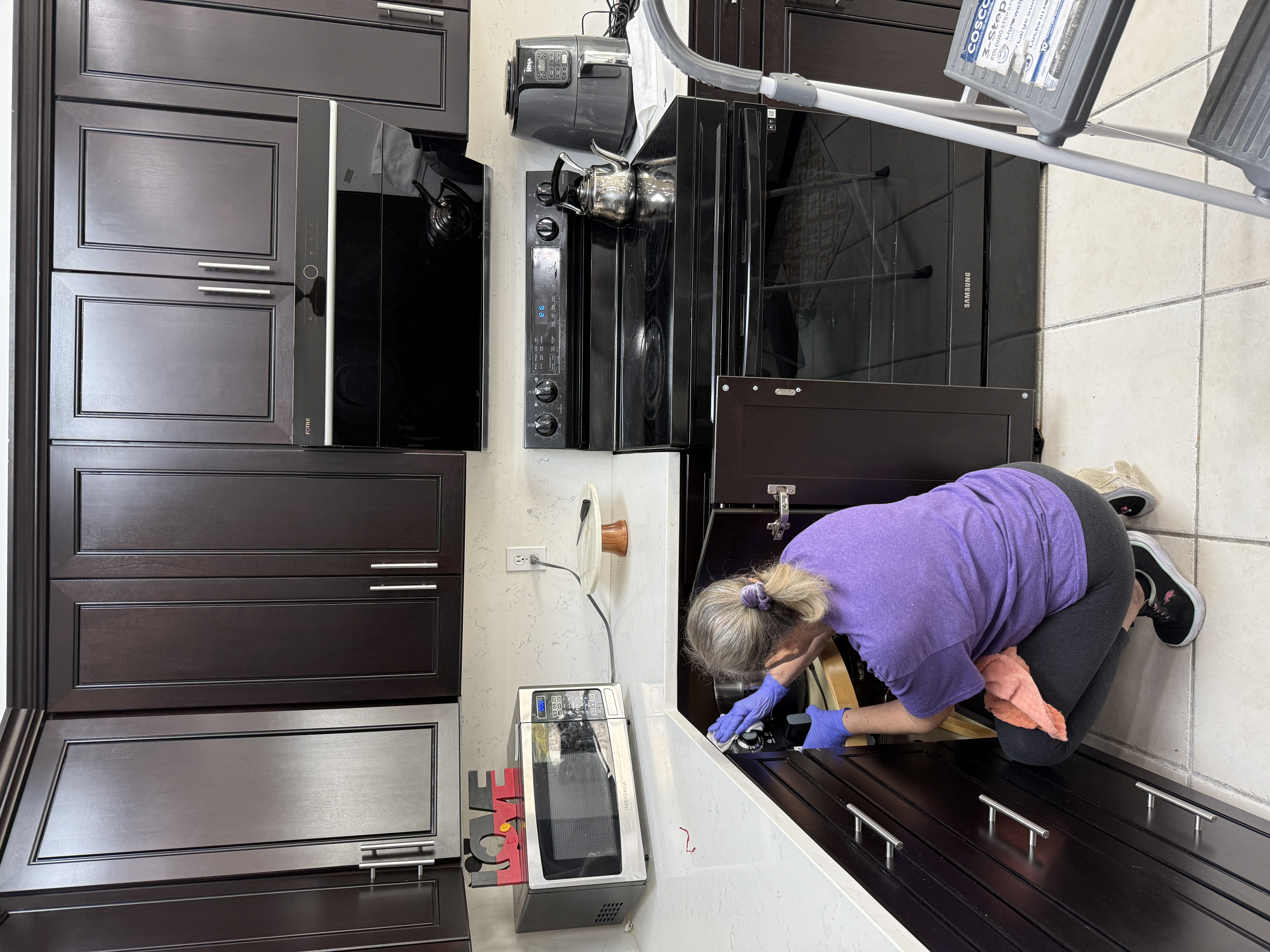 Mojo cleaner scrubbing cabinets