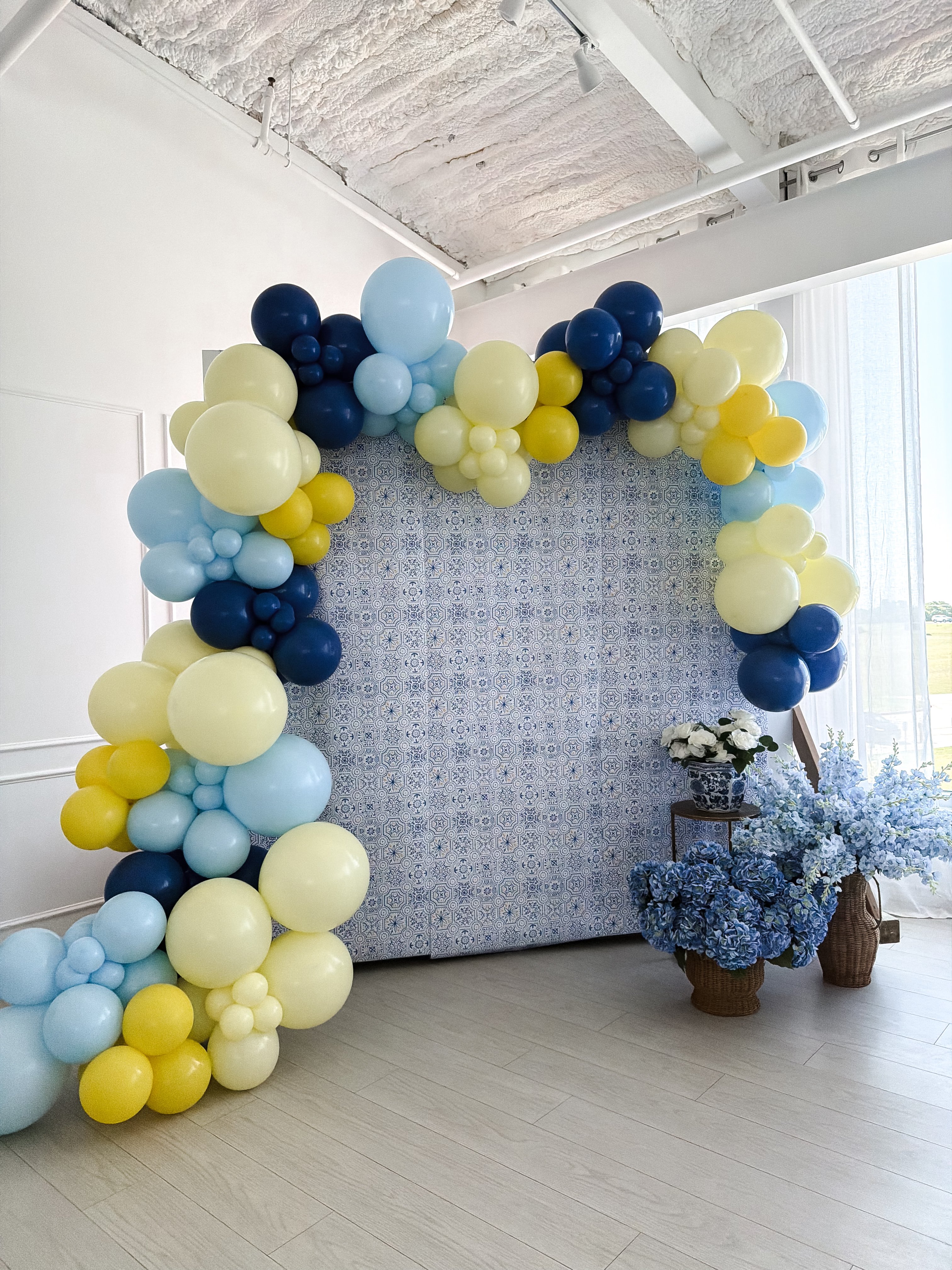 Mediterranean Tile Backdrop & Blue Yellow Balloon Arch