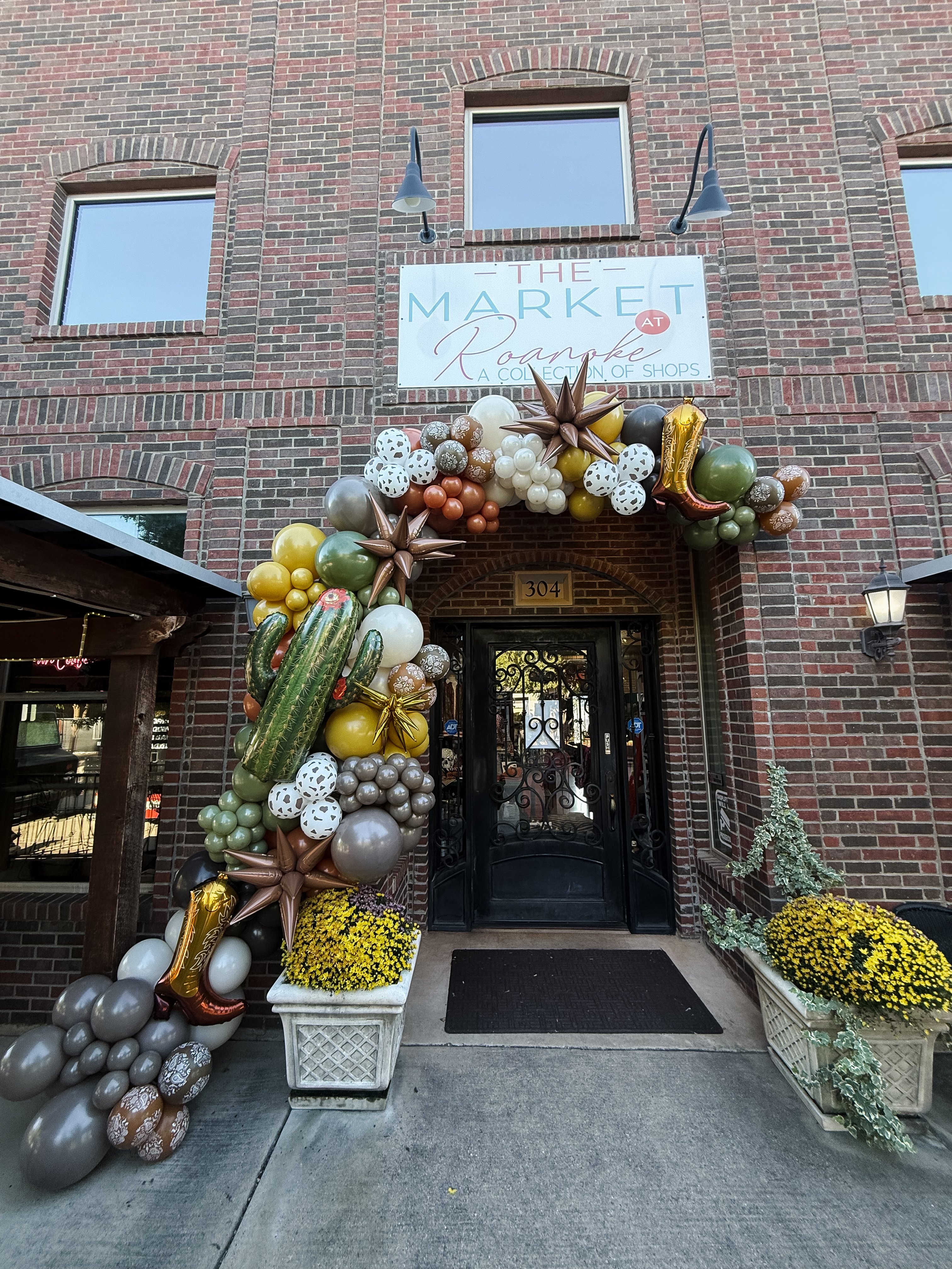 The Market at Roanoke Western Arch with Cactus & Boots