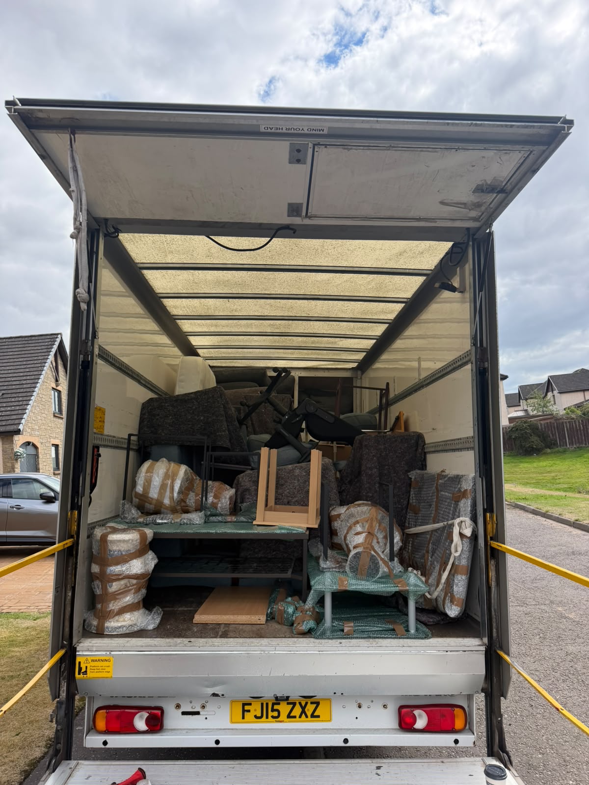 Discovery Movers van packed with protected furniture and items for a Cupar move