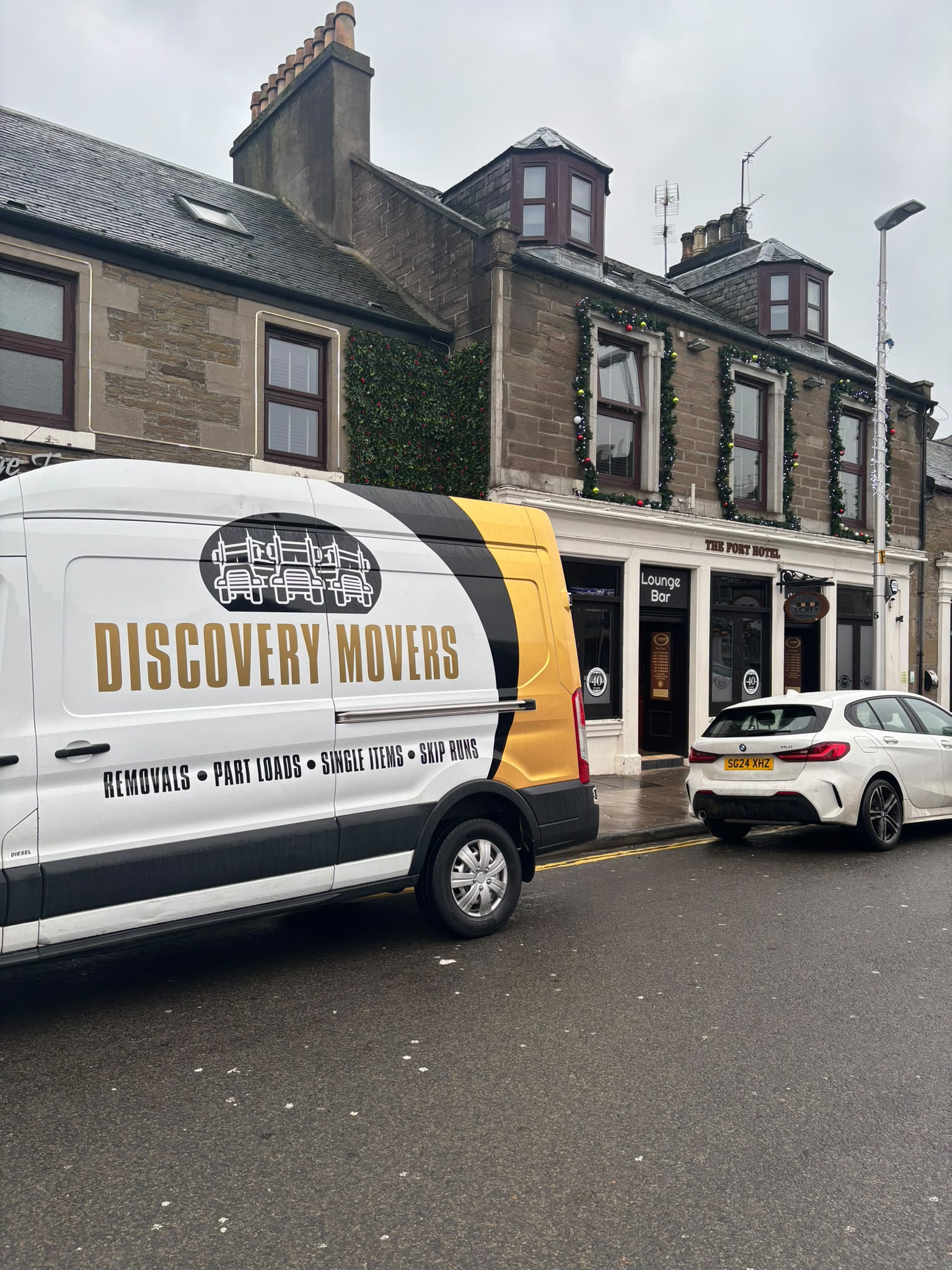 Discovery Movers team loading furniture for a move