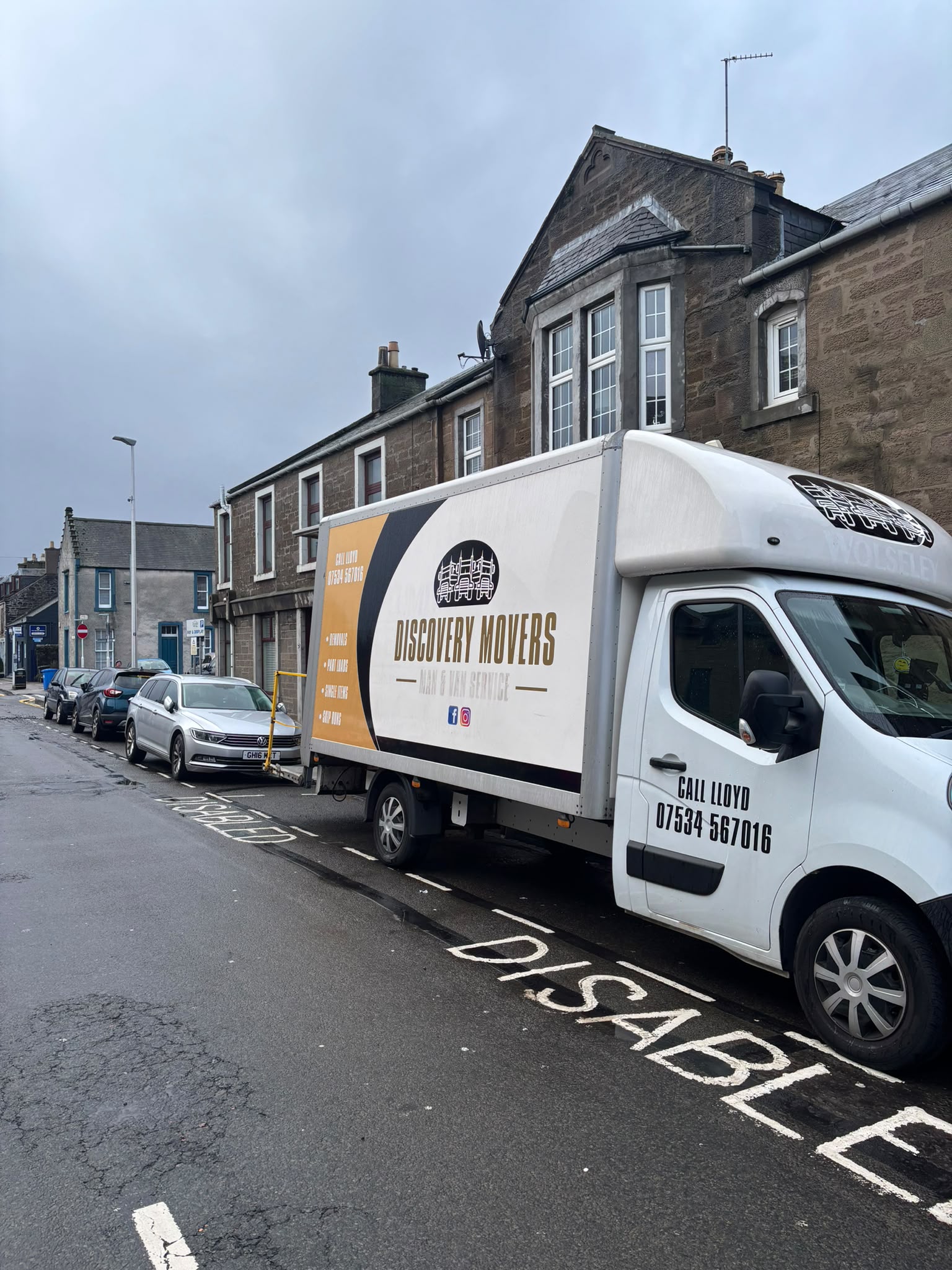 Discovery Movers removal van parked outside a residential property in Dundee