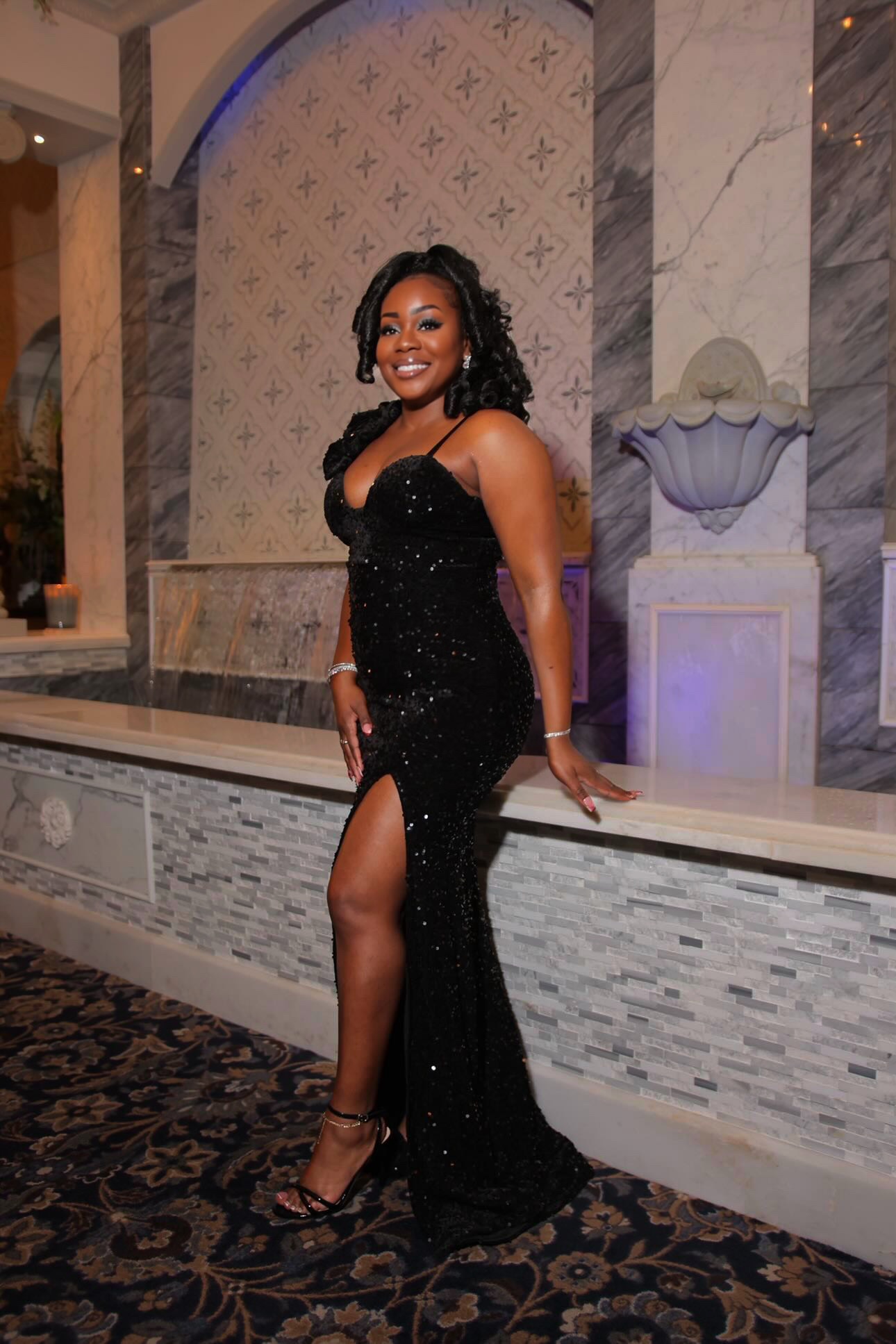 Elesia Tajè in stunning black sequin evening gown