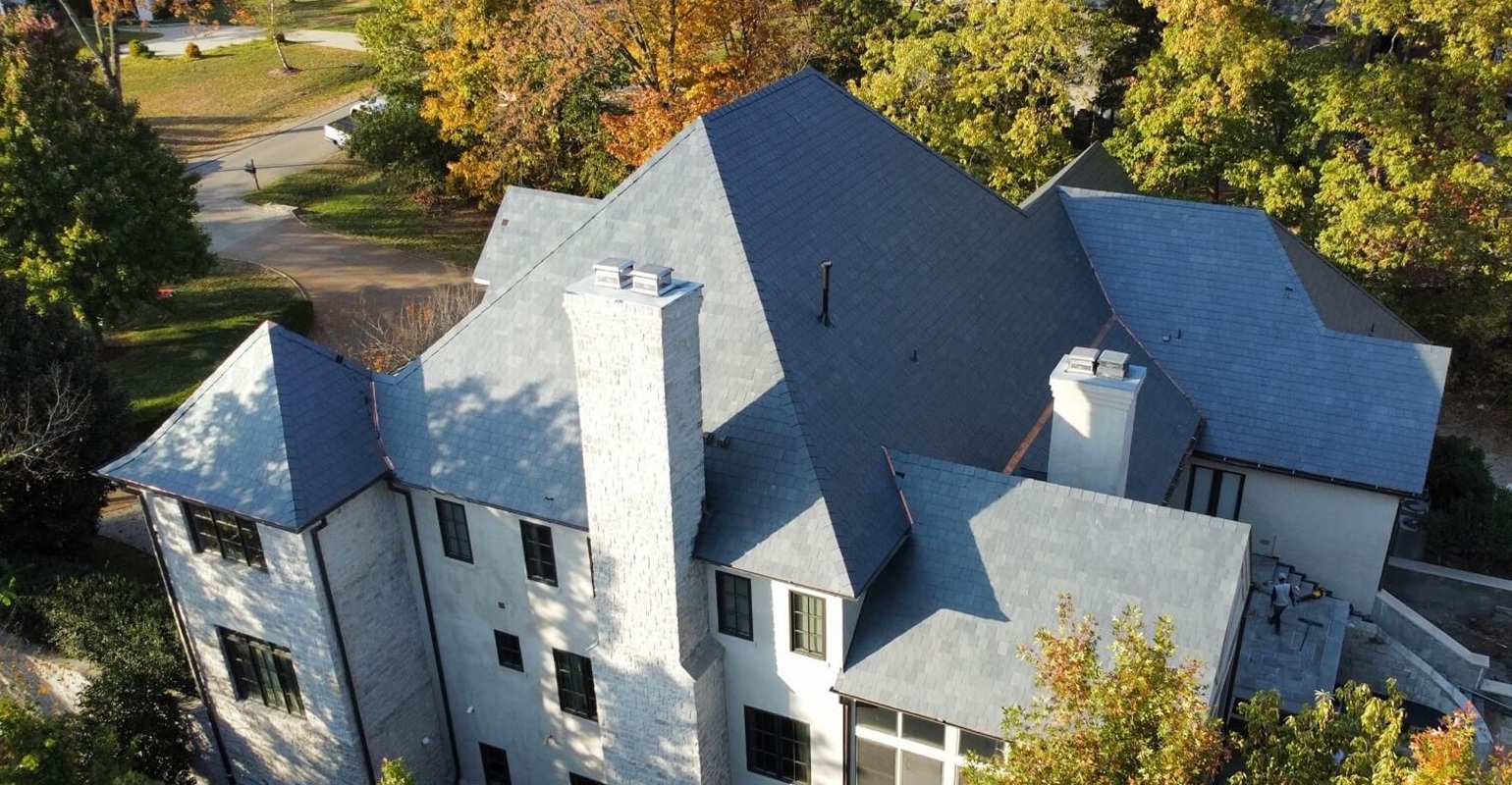 ReadySlate roofing panels being installed on a residential roof