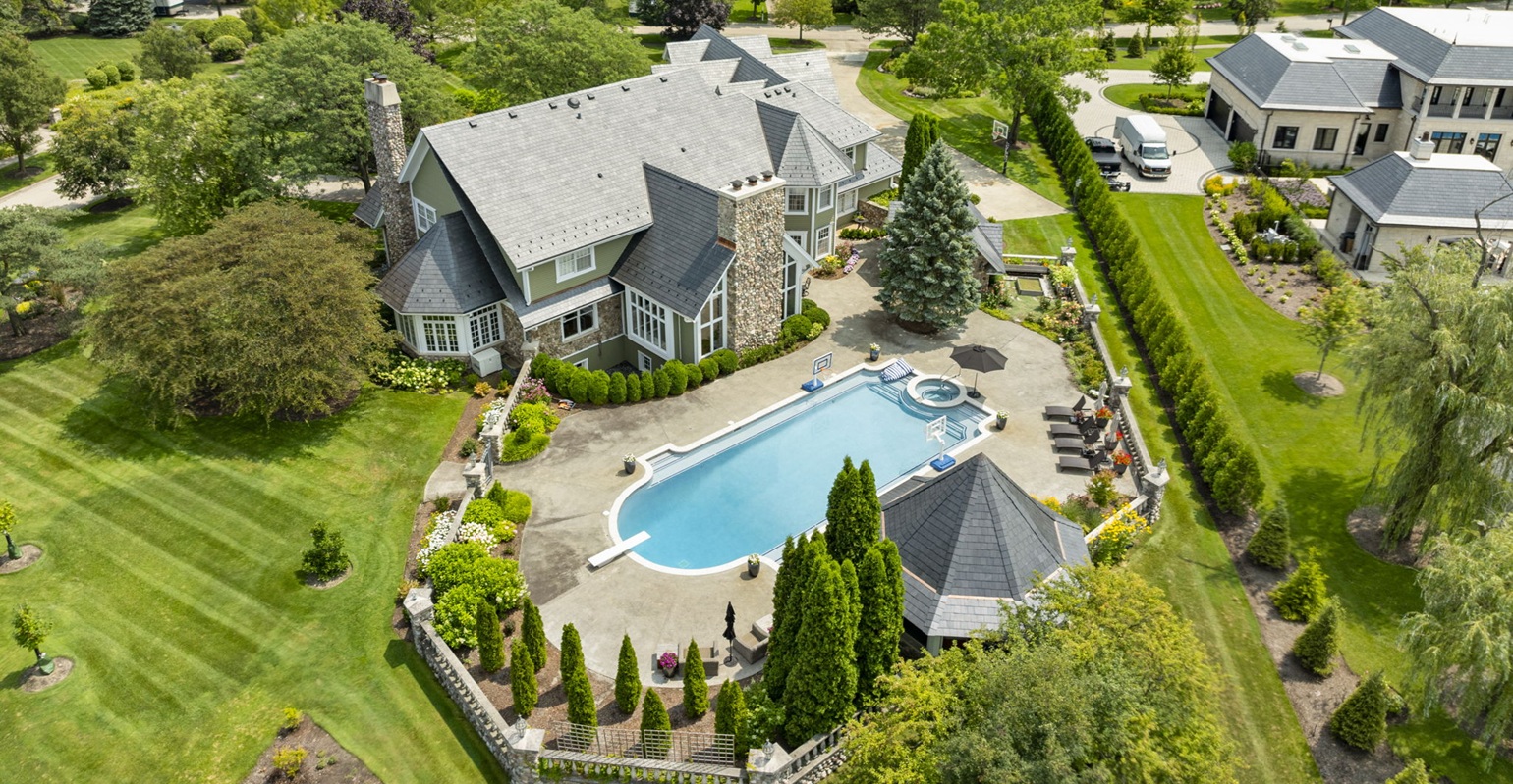 A home with a beautiful natural slate roof that adds curb appeal and resale value