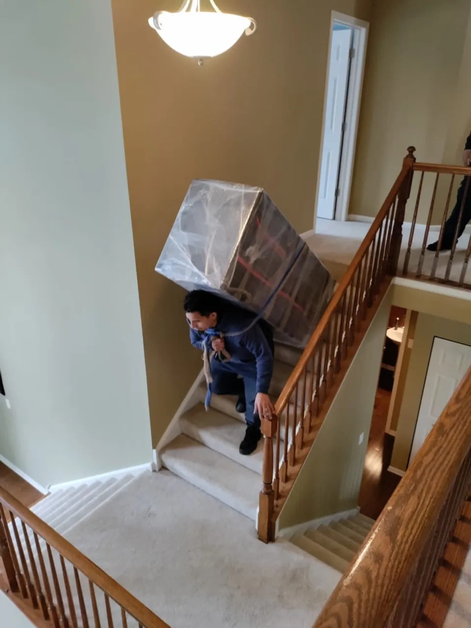 Two-Story Foyer Stair Harness Carry