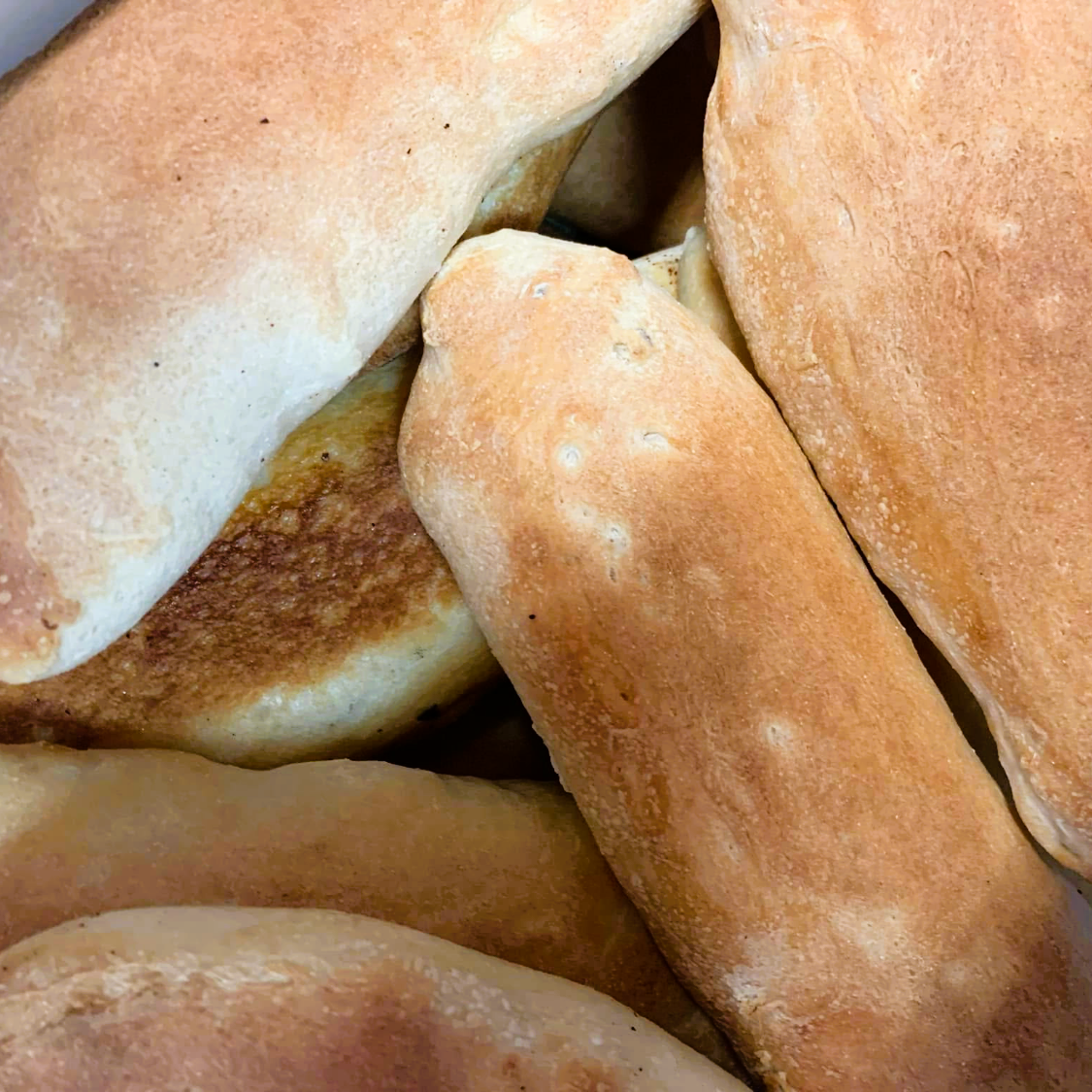 Freshly baked homemade Capri sub rolls and bread